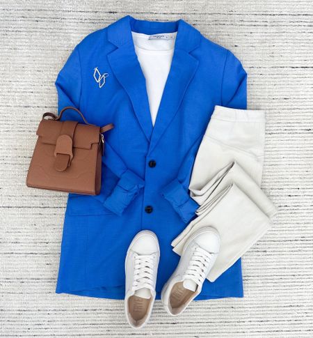 Spring workwear with blue oversized blazer paired with cream pants and sneakers for a chic look. Love this for smart casual or stay at home. Top and pants are 20% off your first purchase with code HKCUNG20! 

#LTKsalealert #LTKstyletip #LTKworkwear