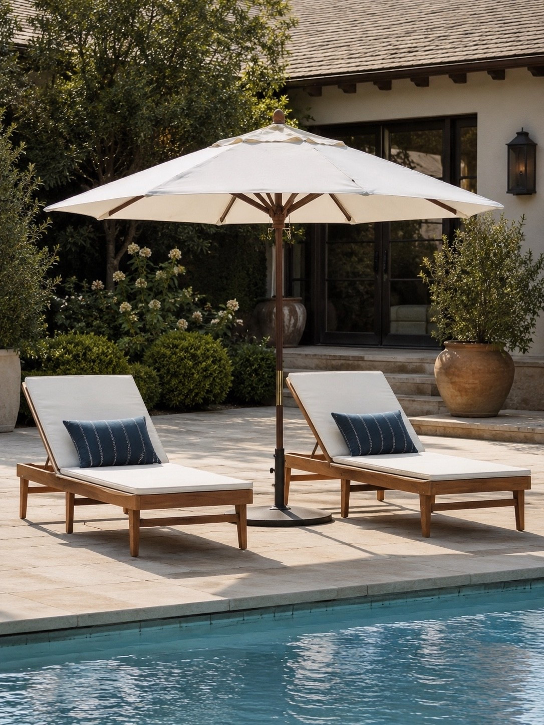 Poolside Perfection ☀️💦

Creating a resort-inspired backyard is easier than ever with a pair of timeless chaise loungers and a classic umbrella for shade. This setup brings the perfect balance of comfort and style, creating an inviting space for morning coffee, afternoon reading, or soaking up the sunshine by the pool.

The warm wood tones, crisp cushions, and elegant umbrella create a look that feels elevated, relaxed, and effortlessly luxurious. If you’re dreaming of a backyard that feels like a private getaway, this is the setup you’ll enjoy all summer long.

Follow @farmtotablecreations on Instagram for more cozy, elevated home finds and outdoor living inspiration. 🤍

#LTKHome #PoolsideLiving #OutdoorDecor #BackyardGoals #PatioInspiration #SummerStyle #OutdoorFurniture #PoolDay #ResortStyleLiving #BackyardRetreat #LuxuryOutdoorLiving #HomeDecorFinds #OutdoorOasis #SummerEntertaining #LTKStyle

#LTKHome #LTKSaleAlert #LTKSeasonal