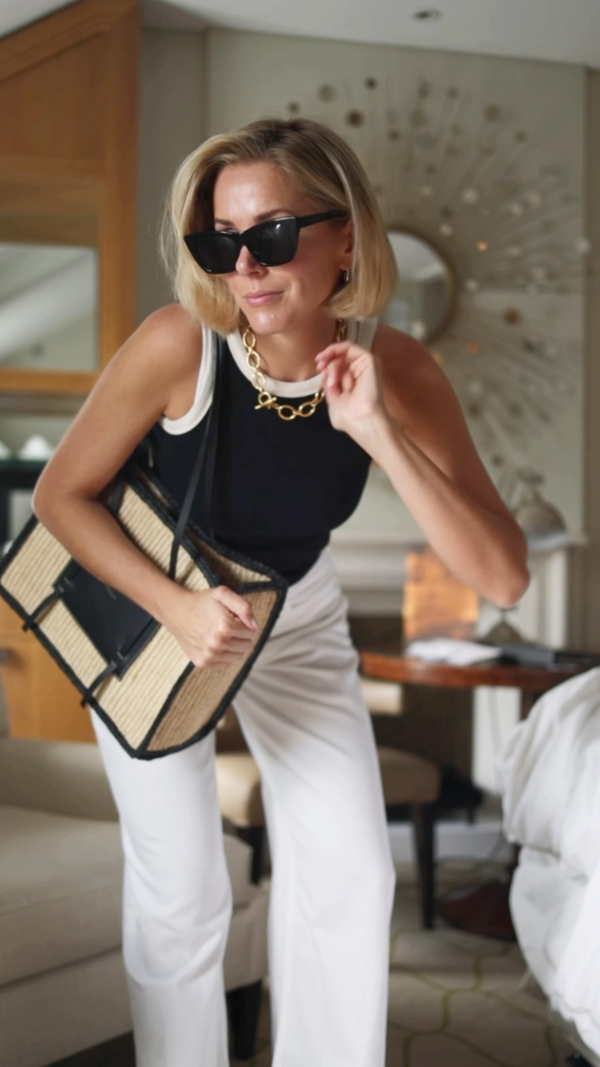 Black white vest
White wide jeans 
Basket bag


#LTKeurope #LTKstyletip #LTKuk