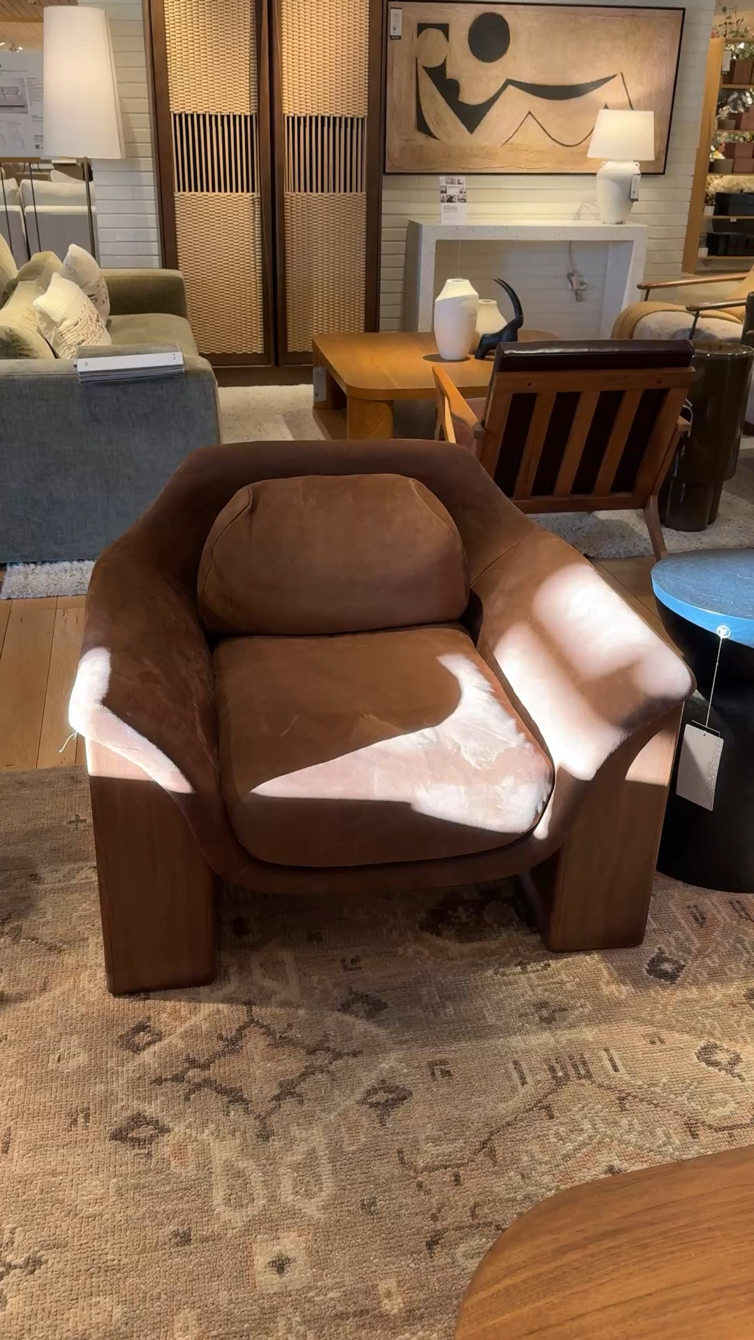 Crate and barrel action chair, very moody very beautiful mix of wood and velvet ￼@Crate & Barrel 

#LTKSpringSale #LTKHome #LTKSaleAlert