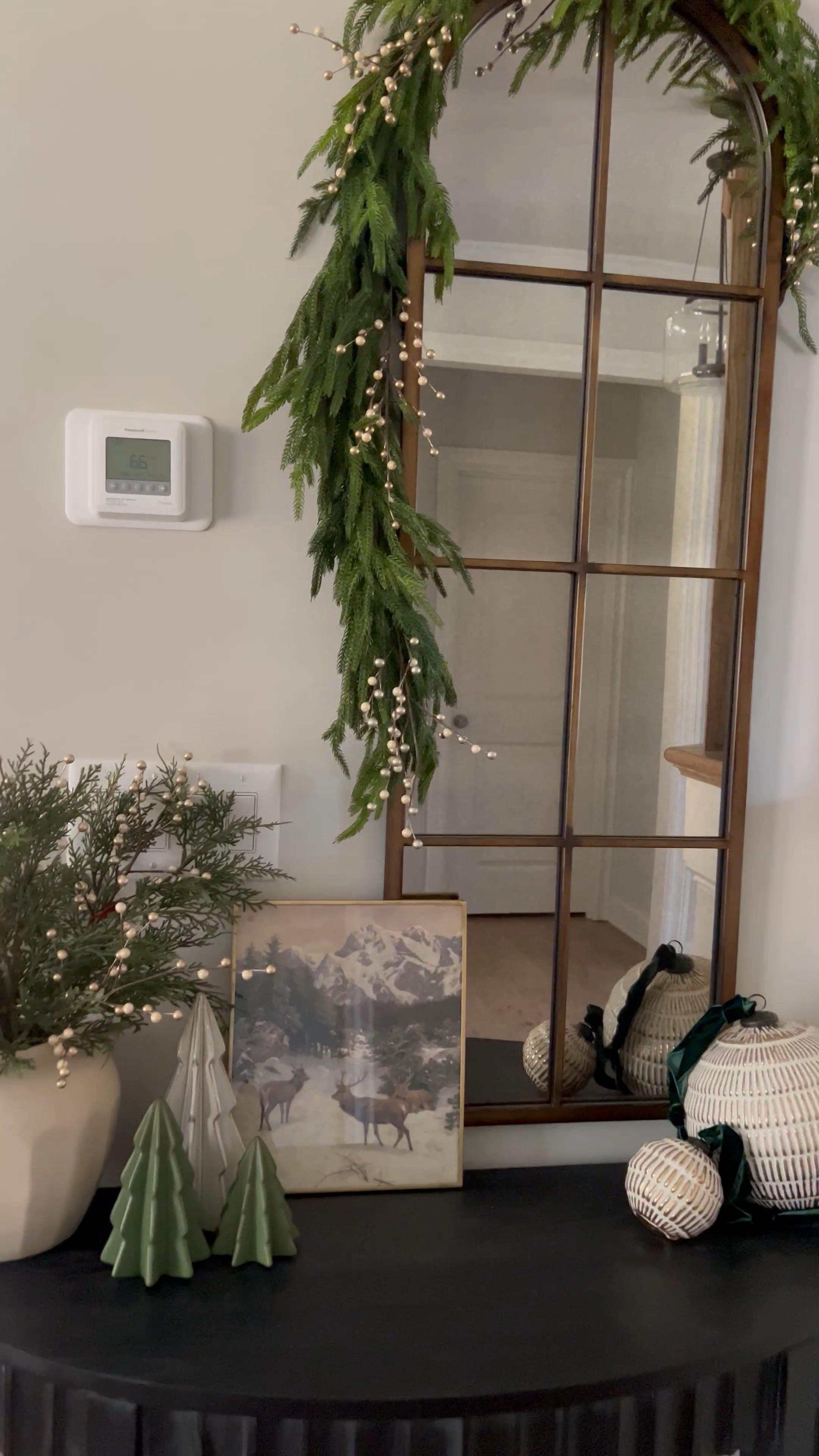 Holiday console table styling✨
It’s still a work in progress…this is how I styled so far. Slowly sprinkling in the holiday magic! 🎄


*gold berry stems are from Hobby lobby. I used a total of nine. 


Christmas decor, ornaments, ribbon, pine garland, bells, cedar branches

#LTKHoliday #LTKhome #LTKSeasonal