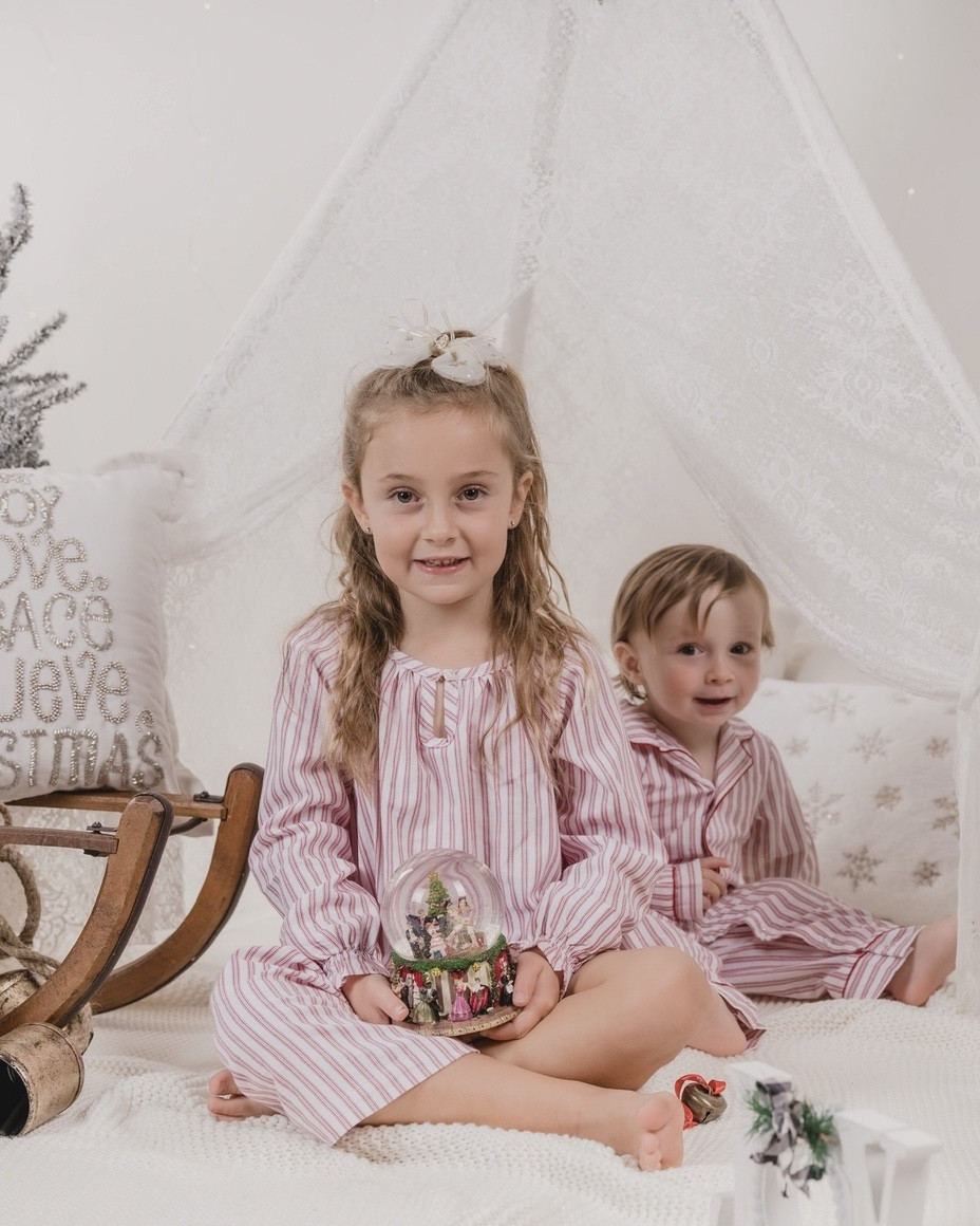 christmas memories ! they're holding the nutcracker snow globe my sweet great aunt phyl gave us here. 

we loved these matching PJs with such a classic feel. Ava still wears hers all the time! MJ needs the next size up 😉

#LTKSeasonal #LTKKids #LTKHoliday