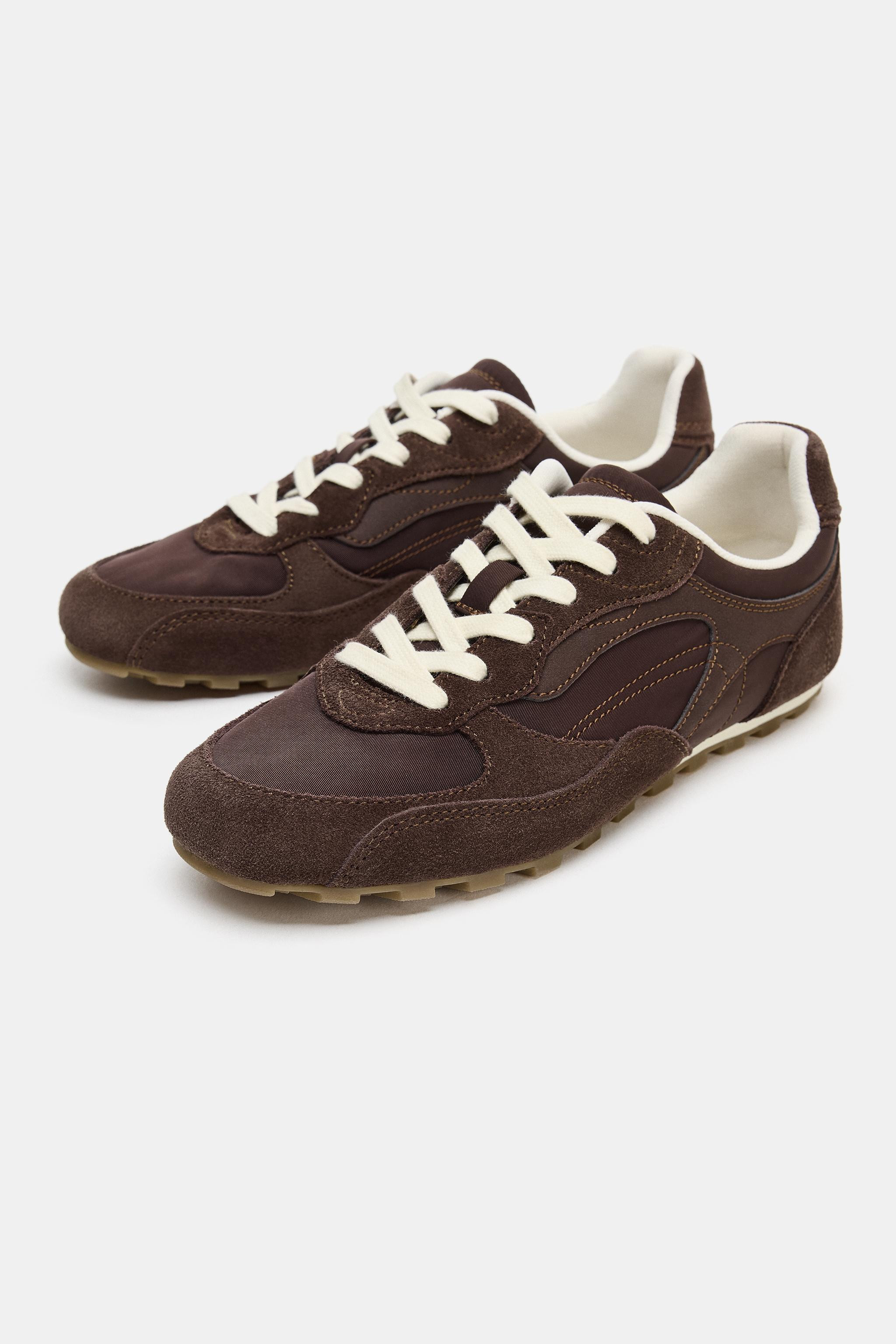 Sneakers in a mix of materials. Topstitching on the upper. Lace-up closure with matching laces. E... | Zara US