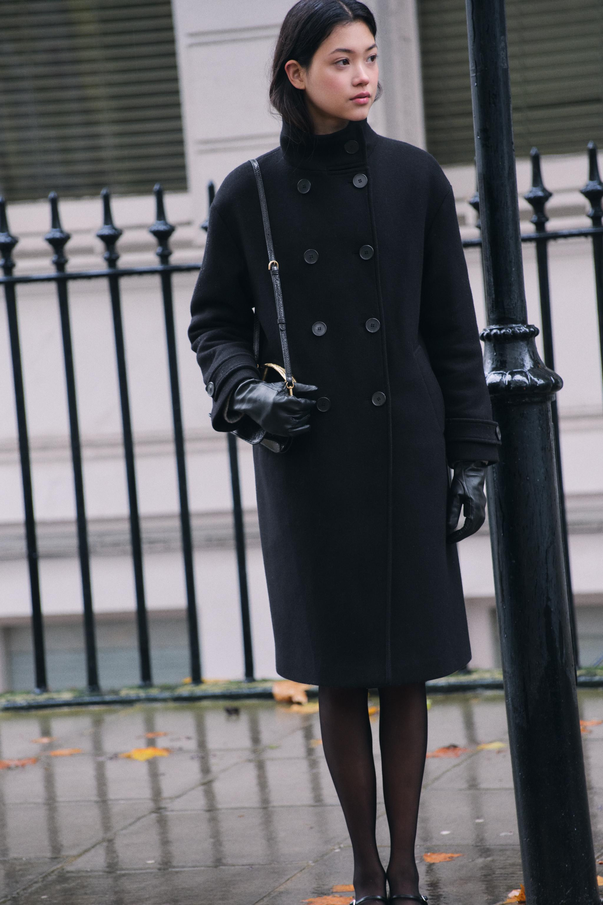 Mini bag with embossed exterior. Gold metallic top handle and adjustable crossbody strap. Interio... | Zara US