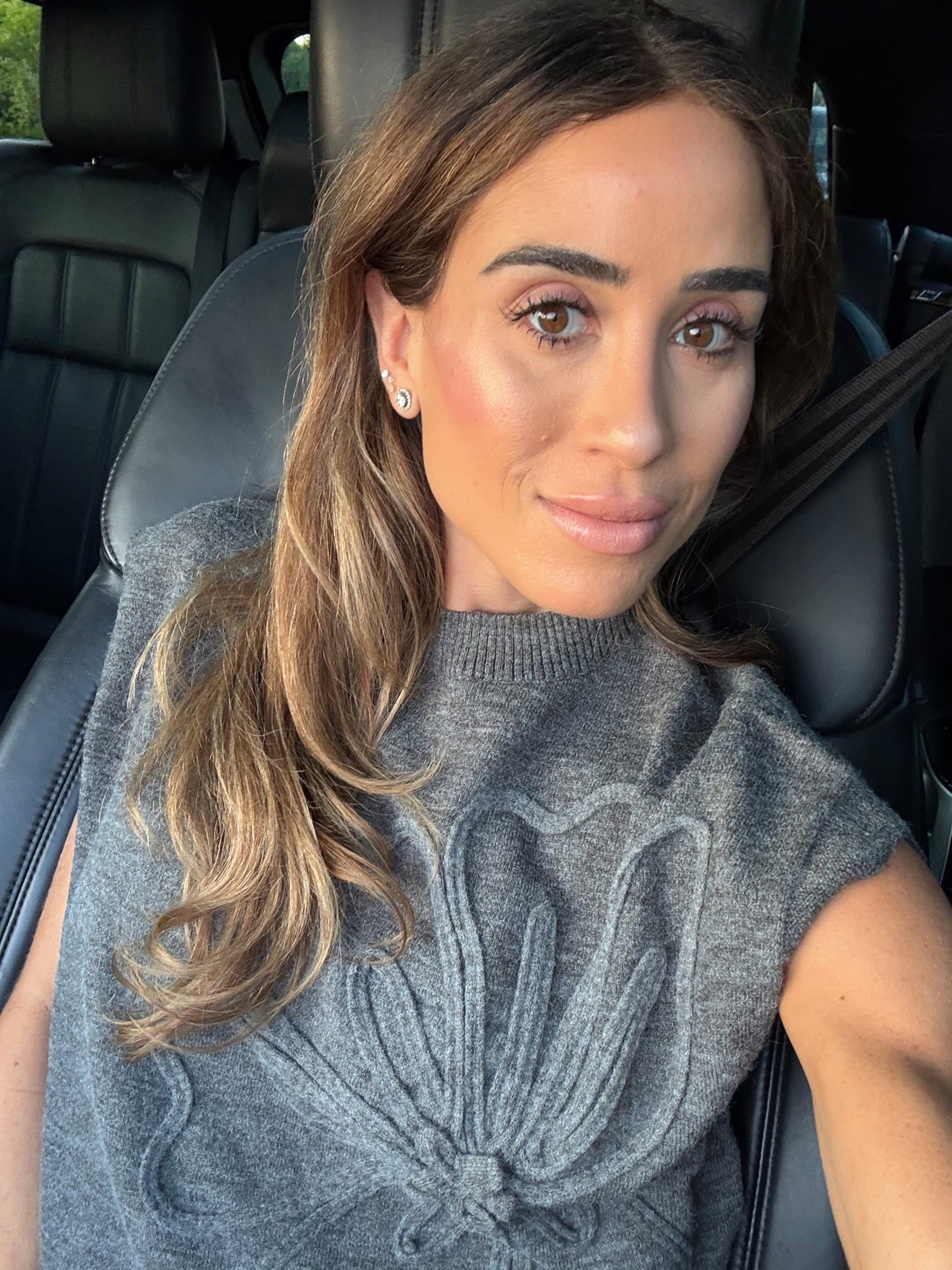 Floral sleeveless sweater looks so expensive 

#LTKPetite