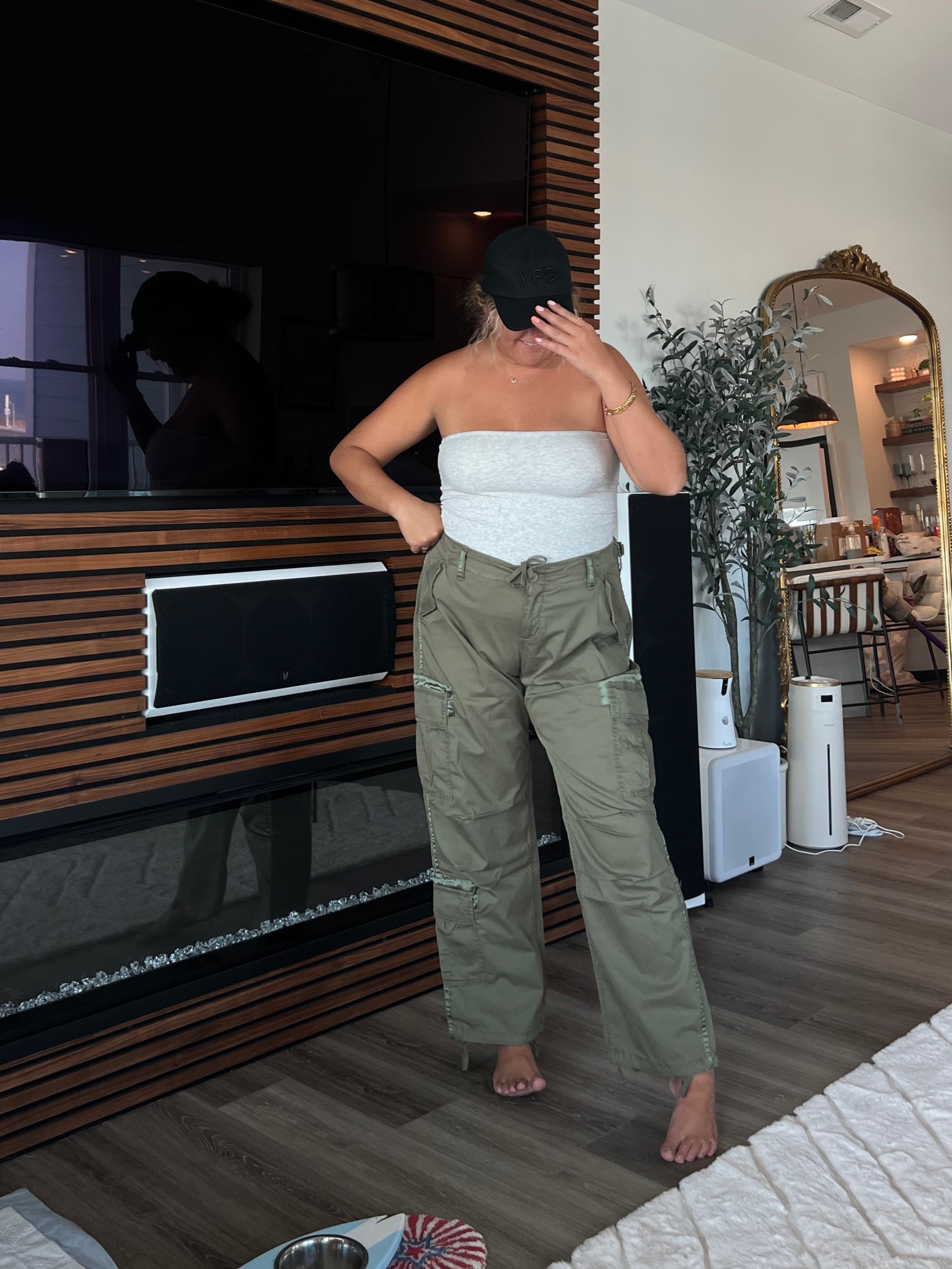 Fall outfit idea. Olive Cargo pants, tube top and baseball cap. All from Abercrombie

#LTKstyletip #LTKSeasonal #LTKmidsize