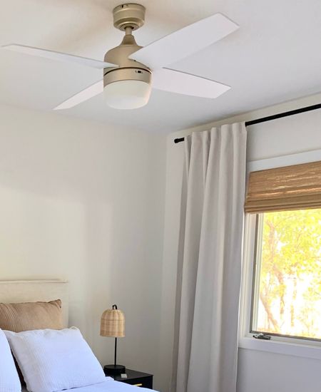 My ceiling fan is currently on sale! Love the clean and modern look in white and champagne gold. Blades are reversible to wood tone. 

Gold accent
Home decor
Natural Bamboo Blinds
Curtains 
Drapes
Curtain rod
Table lamp
Furniture 
Nightstand 
Black metal
Bedroom

#LTKhome #LTKsalealert #LTKfamily