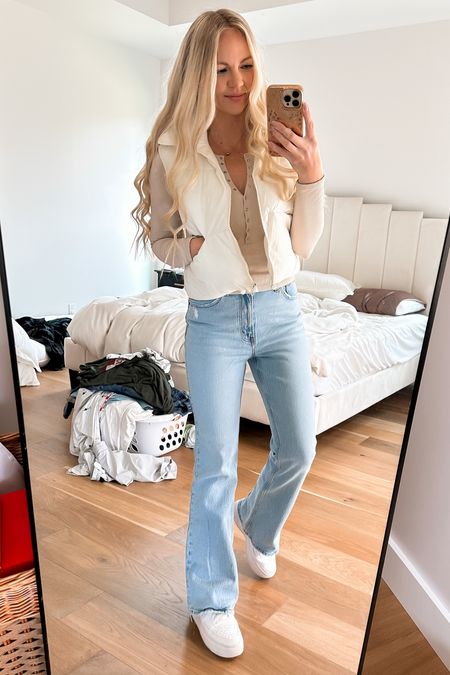 Ignore my pile of laundry and messy bed… these adorable flare jeans are on sale and in stock in all sizes!! 

Also I have a few colors in this polo and Amazon vest and I love every combo! 
