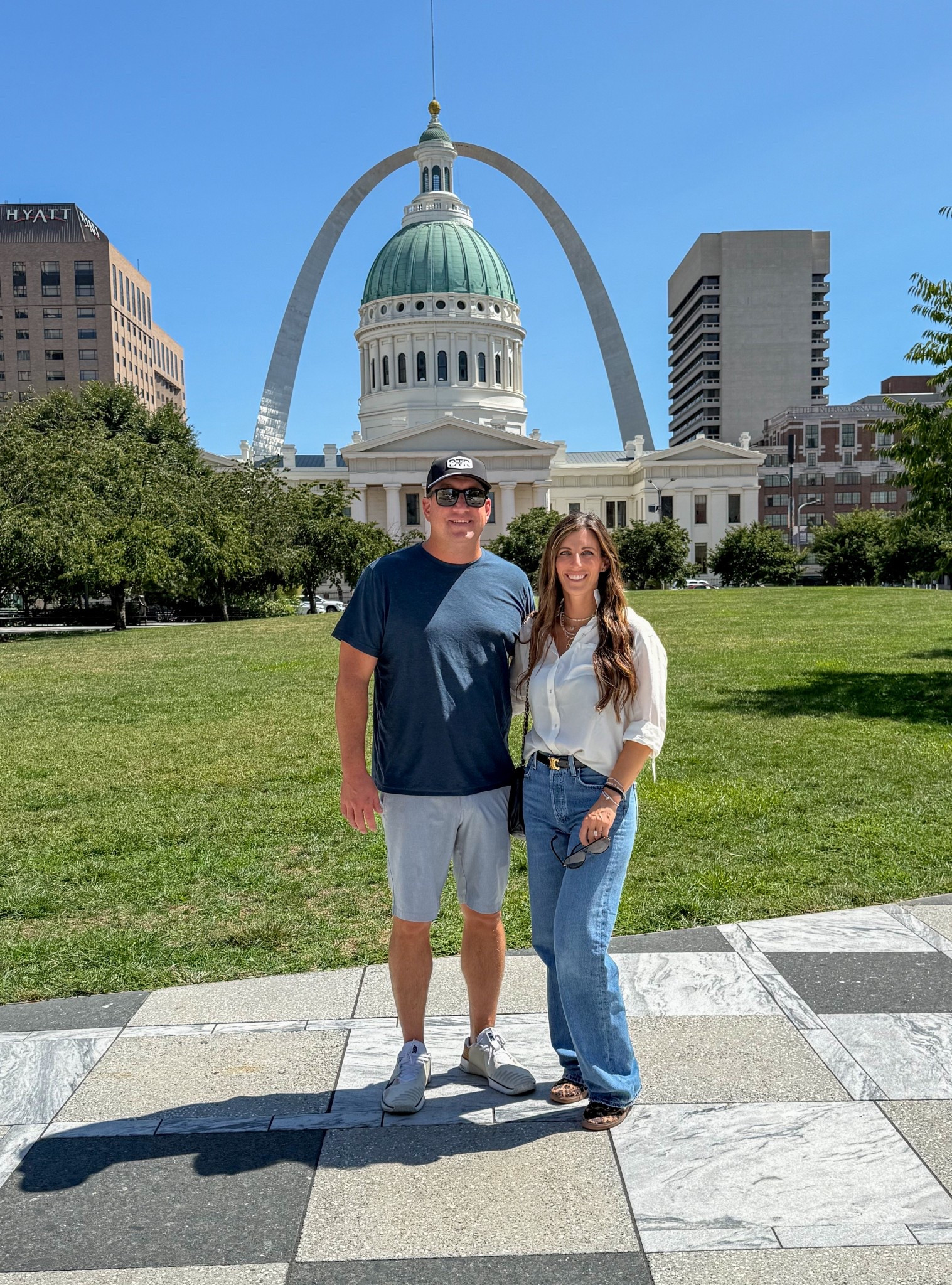 Weekend getaway in St. Louis.  Standing in the same spot we did 22 years ago with the future ahead of us. Grateful then, grateful now. 

His Outfit: navy crewneck t-shirt, light gray athletic shorts, white sneakers, black cap, black sunglasses
Her Outfit: ivory button-down blouse, high-waisted straight-leg jeans, black belt, leopard sneakers, gold layered necklaces, oversized sunglasses

#StLouisWeekend #CouplesTravel #GatewayArch #TravelWithUs #WeekendGetaway #OOTDInspo #CasualStyle #MensSummerStyle #WomensCasualStyle #TimelessLove #22YearsLater #LikeToKnowIt #LTKtravel #LTKmens #LTKwomensfashion

#LTKTravel #LTKFamily #LTKOver40