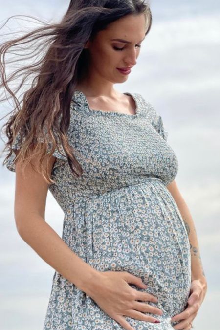 This maternity dress is perfect for spring outfits! 

#LTKunder100 #LTKFind #LTKbump