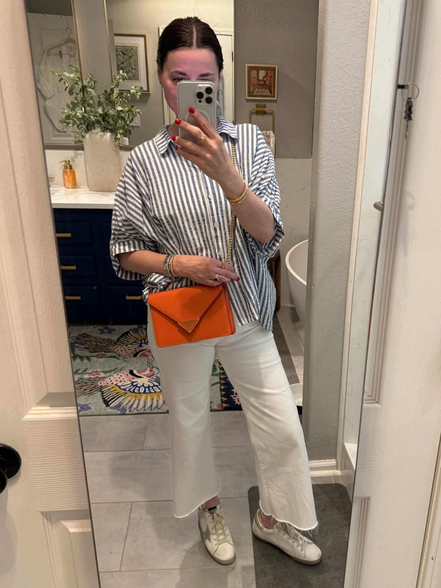 I love a great pair of vintage white jeans!  These have stretch but run small. I would size up by 1 size, maybe 2. I am wearing a 26 - my normal size is 25. They look great with a striped button down - add a bag that’s a pop of color and 😘

#LTKOver40 #LTKStyleTip #LTKWorkwear