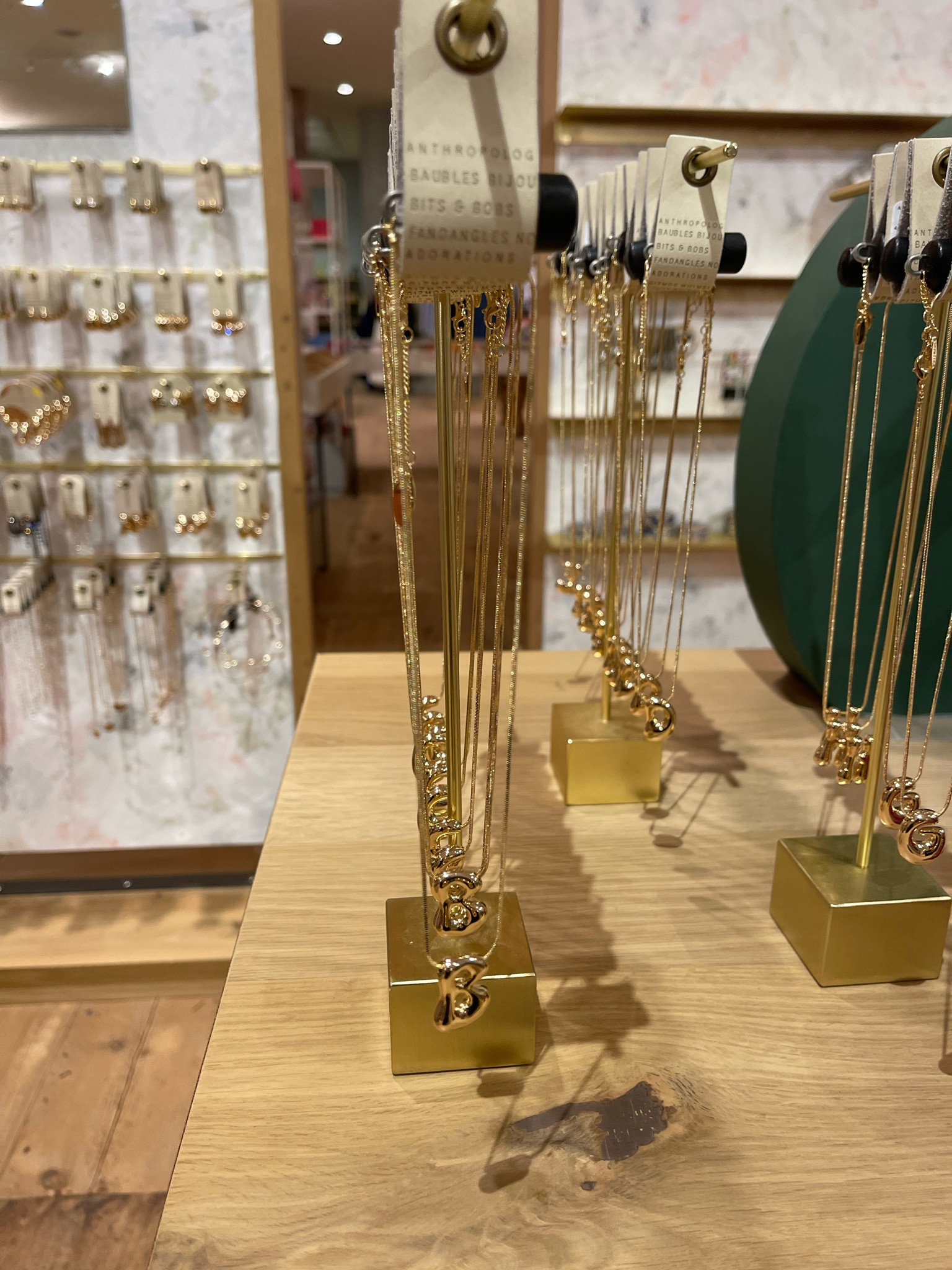 cutest bubble monogram necklace on sale at Anthro!✨💫🤍

#LTKStyleTip #LTKHoliday #LTKSaleAlert