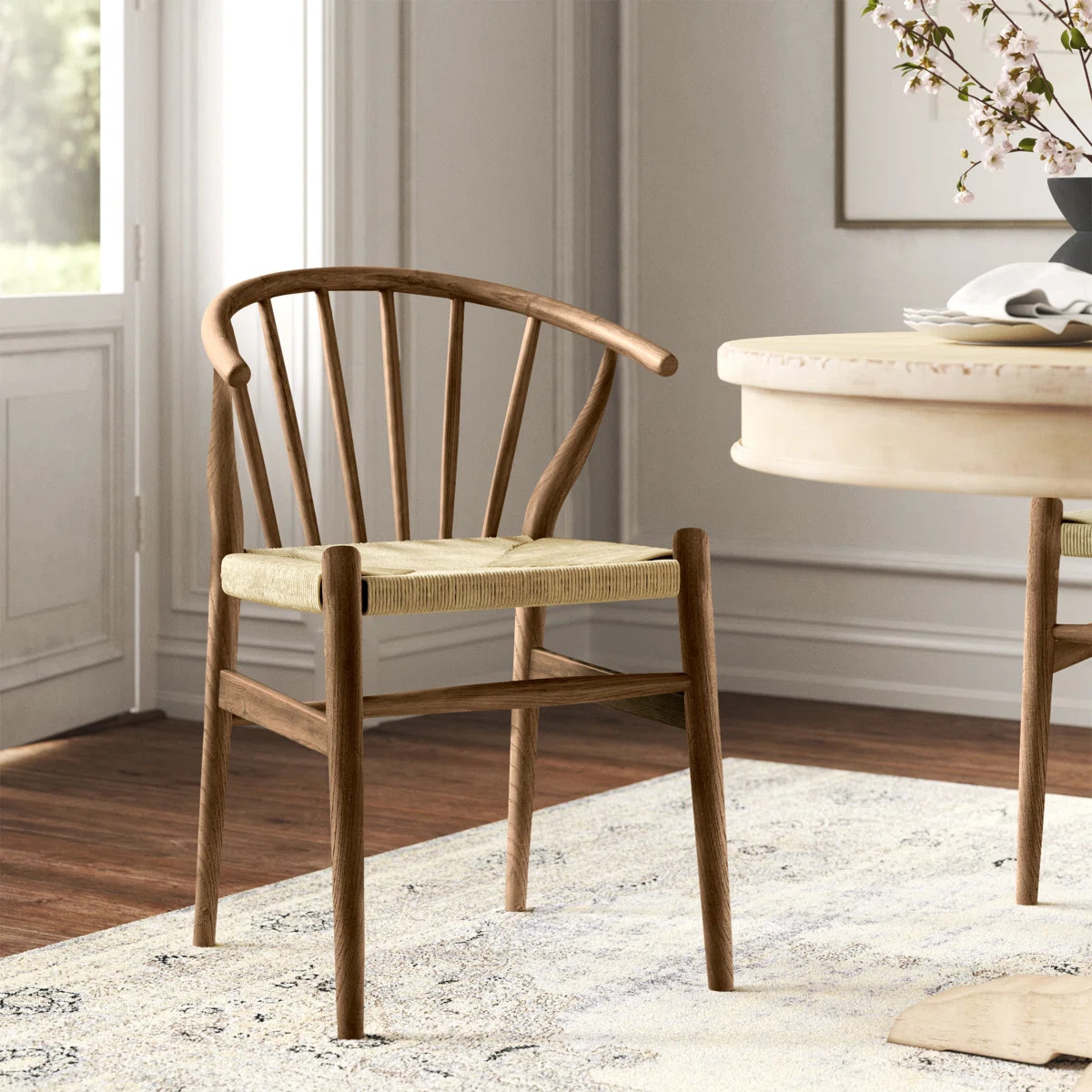 Featuring a curved back, tapered wood legs, and classic spindles, this dining chair is anchored b... | Wayfair North America