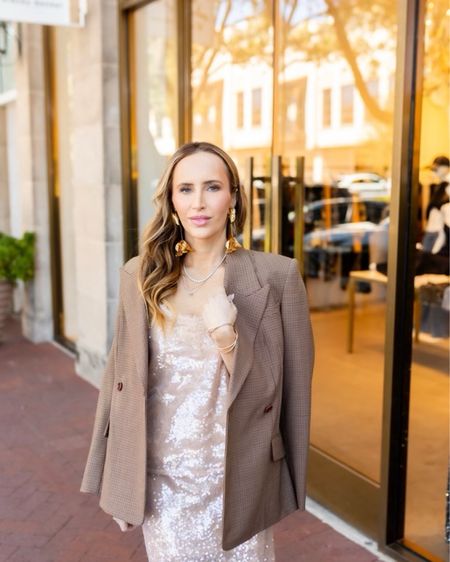 Another day, another chance to sparkle ✨ I love the flair these neutral sequins add to both this cami and skirt. They are perfect pieces for the holidays or to add a little something special to an every day look. I paired it with a classic blazer and gold floral drop earrings that I get so many compliments on whenever I wear them. The exact pair isn’t available but I found a very similar style. 
 #jonathamsimkhai #sequins #nudesequins #essentialjewelry #statementjewelry #blazer #fallessentials #holidayessentials #holidaystyle 


Follow my shop @theseayside on the @shop.LTK app to shop this post and get my exclusive app-only content!

#liketkit #LTKHoliday #LTKSeasonal #LTKstyletip
@shop.ltk
https://liketk.it/4ncDI

#LTKHoliday #LTKSeasonal #LTKstyletip