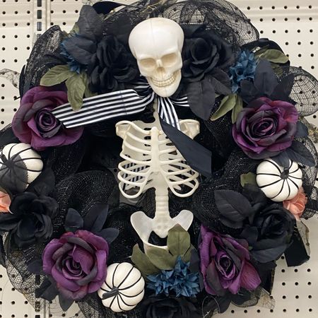 22" Whimsical Skeleton & Pumpkin Wreath. Decorate your home this Halloween with this fun wreath by Ashland. Featuring a spooky skeleton, pumpkins, floral stems and spider webs, this wreath is perfect for your front door this year.

#LTKparties #LTKsalealert #LTKbeauty