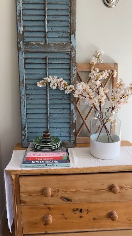 Monday afternoon views!🌸
Stacked books, stacked green plates, color lock vase, cherry blossoms, rattan kitchen pendant , spring decor.

#LTKhome #LTKunder50 #LTKSeasonal