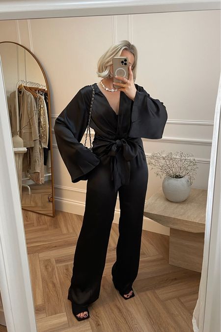 Christmas partywear outfit ideas - black satin jumpsuit from pretty lavish, black heeled mules, Pearl necklace from Astrid & miyu & black Chanel bag   

#LTKSeasonal #LTKHoliday #LTKstyletip