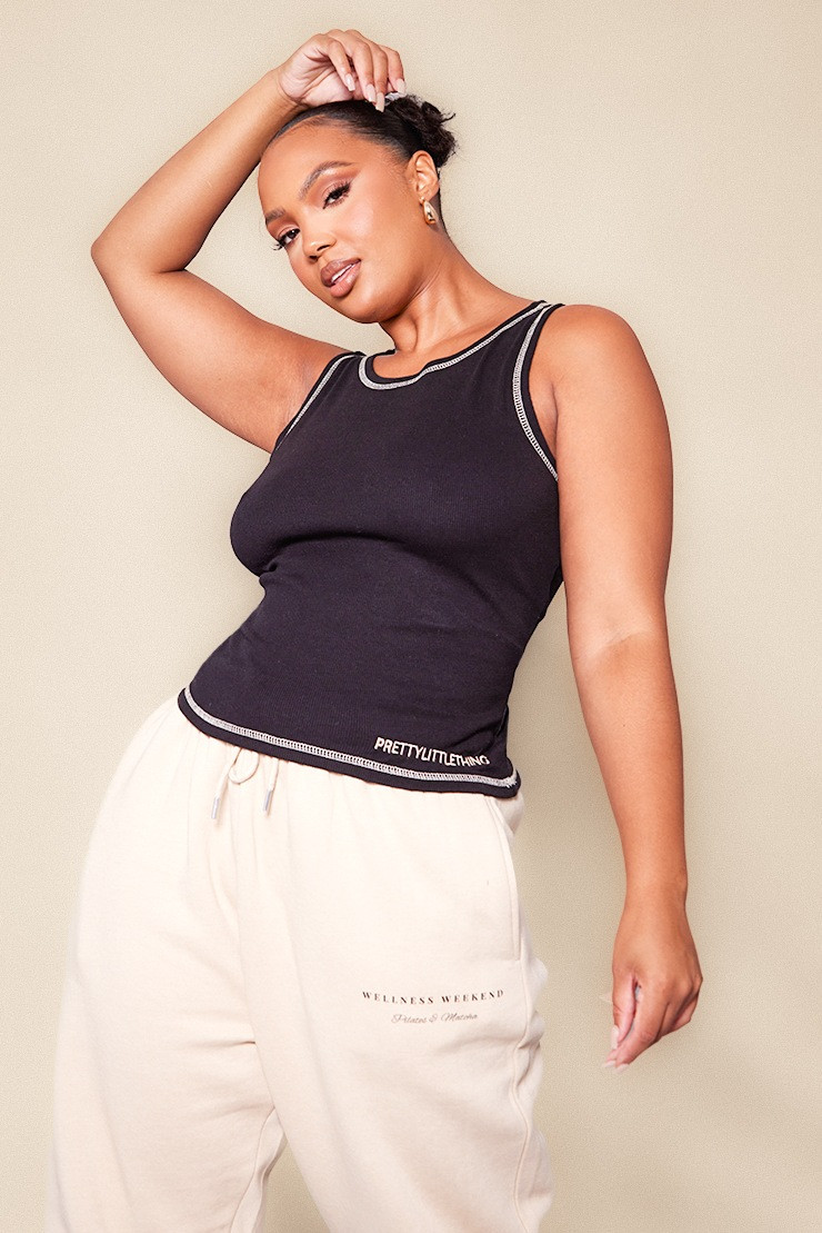 PRETTYLITTLETHING Plus Black Embroidered Contrast Stitch Rib Racer Long Top | PrettyLittleThing US