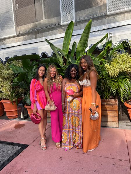 Last night with my girls in Miami!! In love with this pink and orange color palette!! Dress is from Petal & Pup. Paired with some pink heels, pink resin clutch and sunglasses!!

#LTKstyletip #LTKtravel #LTKshoecrush