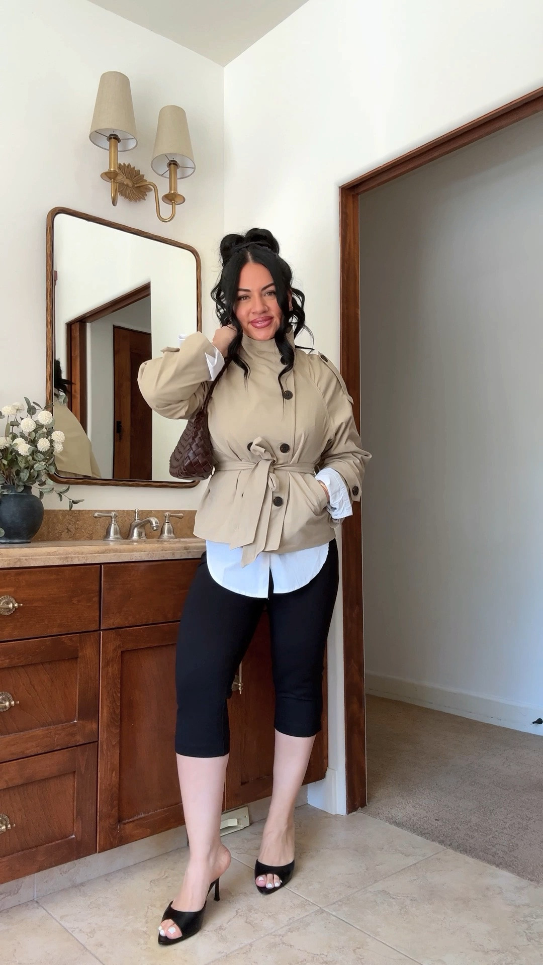 i’m a size 12 in the capris, medium in the trench, and large in the white button up!