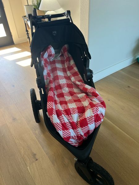 Custom stroller blanket! Incredible. The stroller straps come through the spaces in the back of the blanket so you can still strap in your little one! Also doesn’t slide down to drag the ground or get caught  in wheels 🙌 