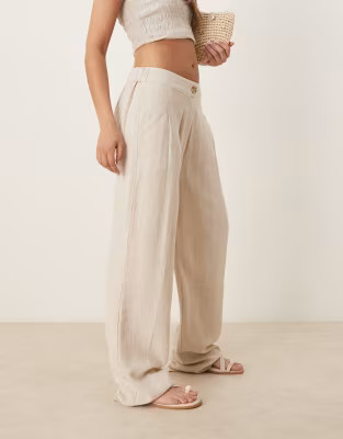 ASOS DESIGN pleat front tapered pants with linen in stone | ASOS (Global)