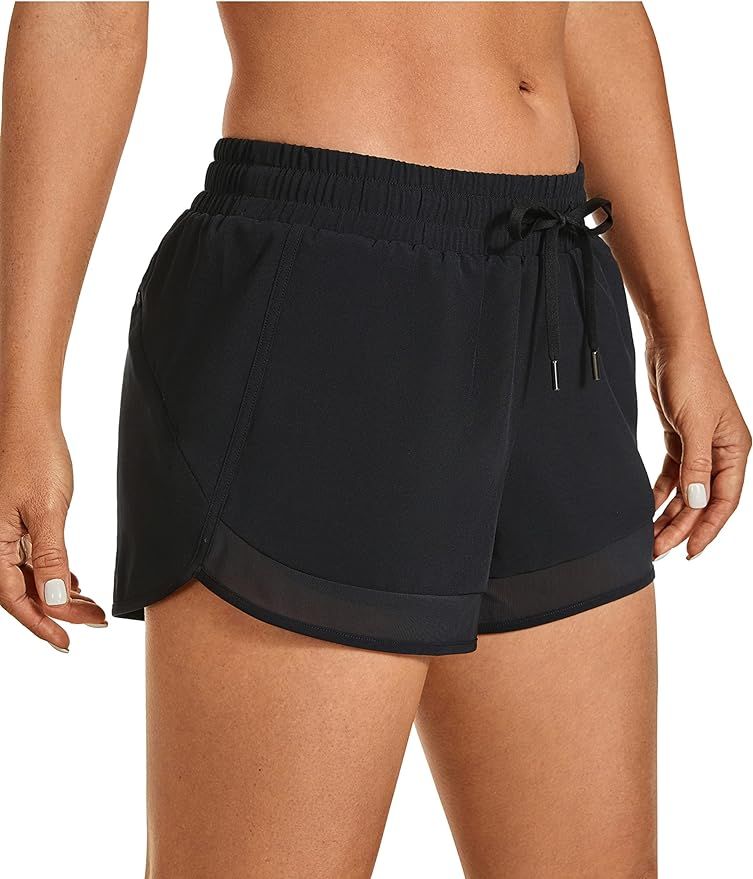 CRZ YOGA Women's Mid Rise Running Shorts Mesh Liner 3'' - Quick Dry Drawstring Workout Athletic G... | Amazon (US)