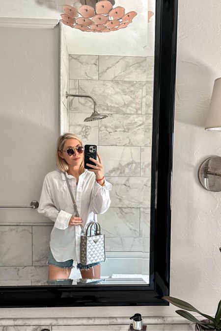 White Shirt
Shorts
Agolde shorts
Prada bag
Prada mini tote


Summer outfit 
Summer Style 
Vacation outfit
#Itkseasonal
#Itkover40
#Itku
#LTKItBag #LTKFindsUnder100 #LTKSaleAlert