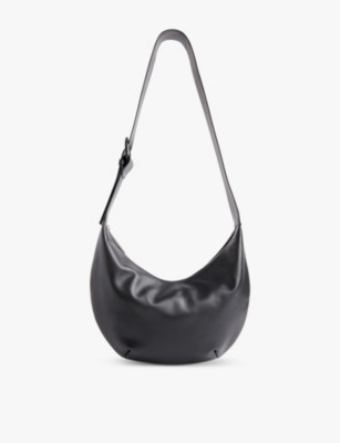 Sia curved leather cross-body bag | Selfridges