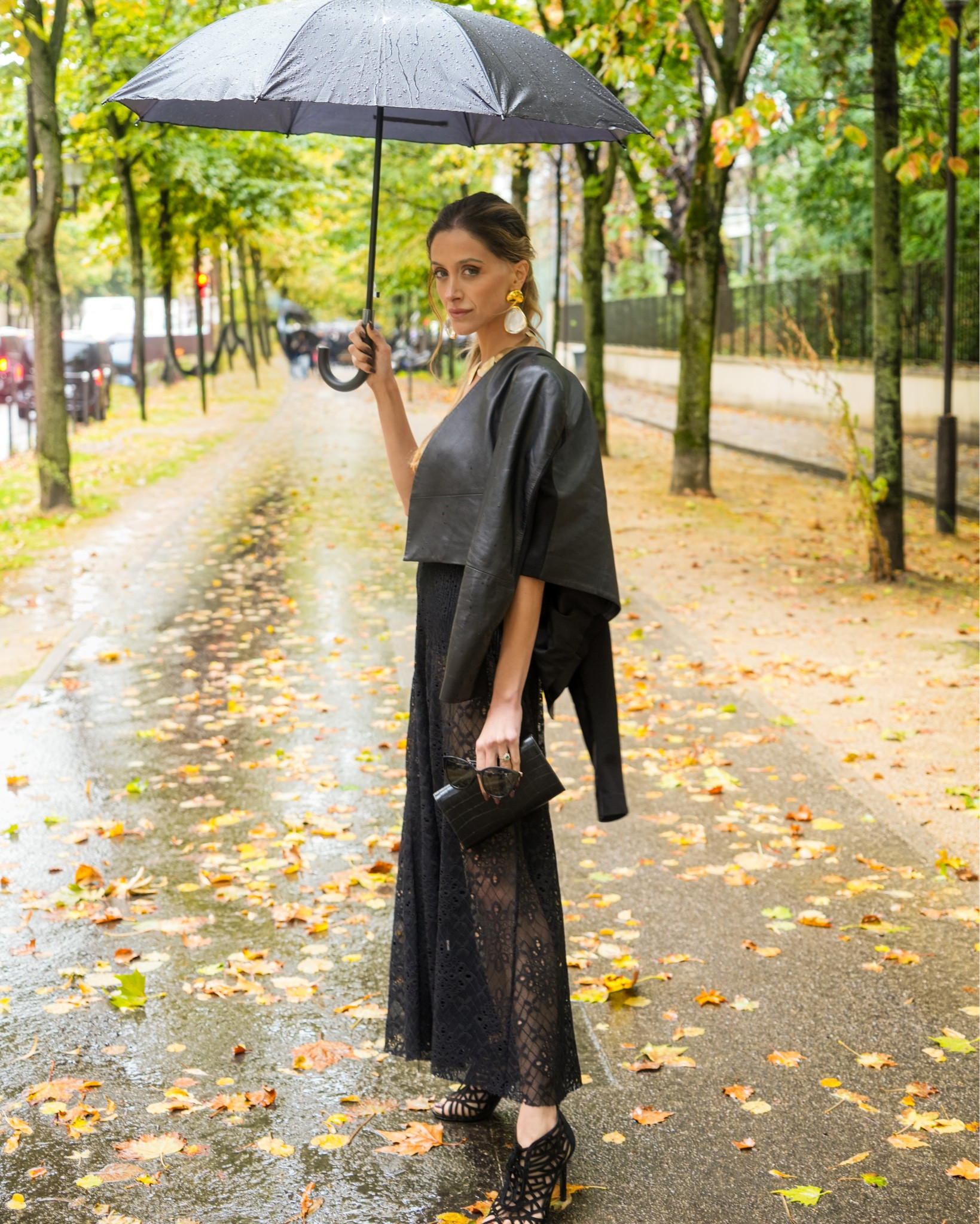 Alaïa show day at PFW SS26. Paris rain calls for an all-black lace column dress with a cropped leather jacket on the shoulders, gold statement necklace + earrings, caged heels and a mini clutch. Light, fluid, and leg-lengthening with the sheer skirt—elegant from venue to venue.

Style it with a seamless black slip/bodysuit if you want more coverage. Tap to shop the exact pieces and my luxe-for-less edit below.

PFW street style, Alaia show look, black strapless lace dress, sheer maxi dress, cropped leather jacket, gold statement jewelry, caged heeled sandals, rainy day outfit, Paris chic, evening outfit, French Riviera to Paris style

#LTKstyle #LTKSeasonal #LTKParis #PFW #ParisFashionWeek #Alaia #RainyDayStyle #AllBlackLook

#LTKautumn #LTKfrance #LTKFashionMonth