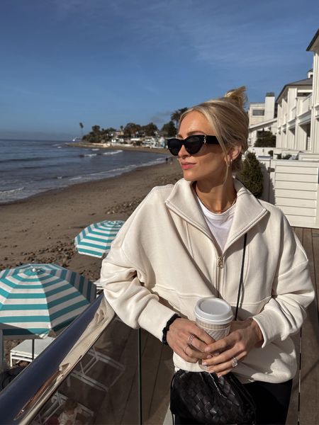 Morning beach walks 🤍 living in this Varley ribbed sweatshirt, the texture is such a nice detail - and these leggings are my MVP, I travel nowhere without them! Best black leggings out there 

Sizes worn here:
Tee XS (TTS, boxy)
Sweatshirt XS (oversized)
Leggings XS (TTS, I have the shorter length) 

#LTKfitness #LTKSeasonal #LTKtravel