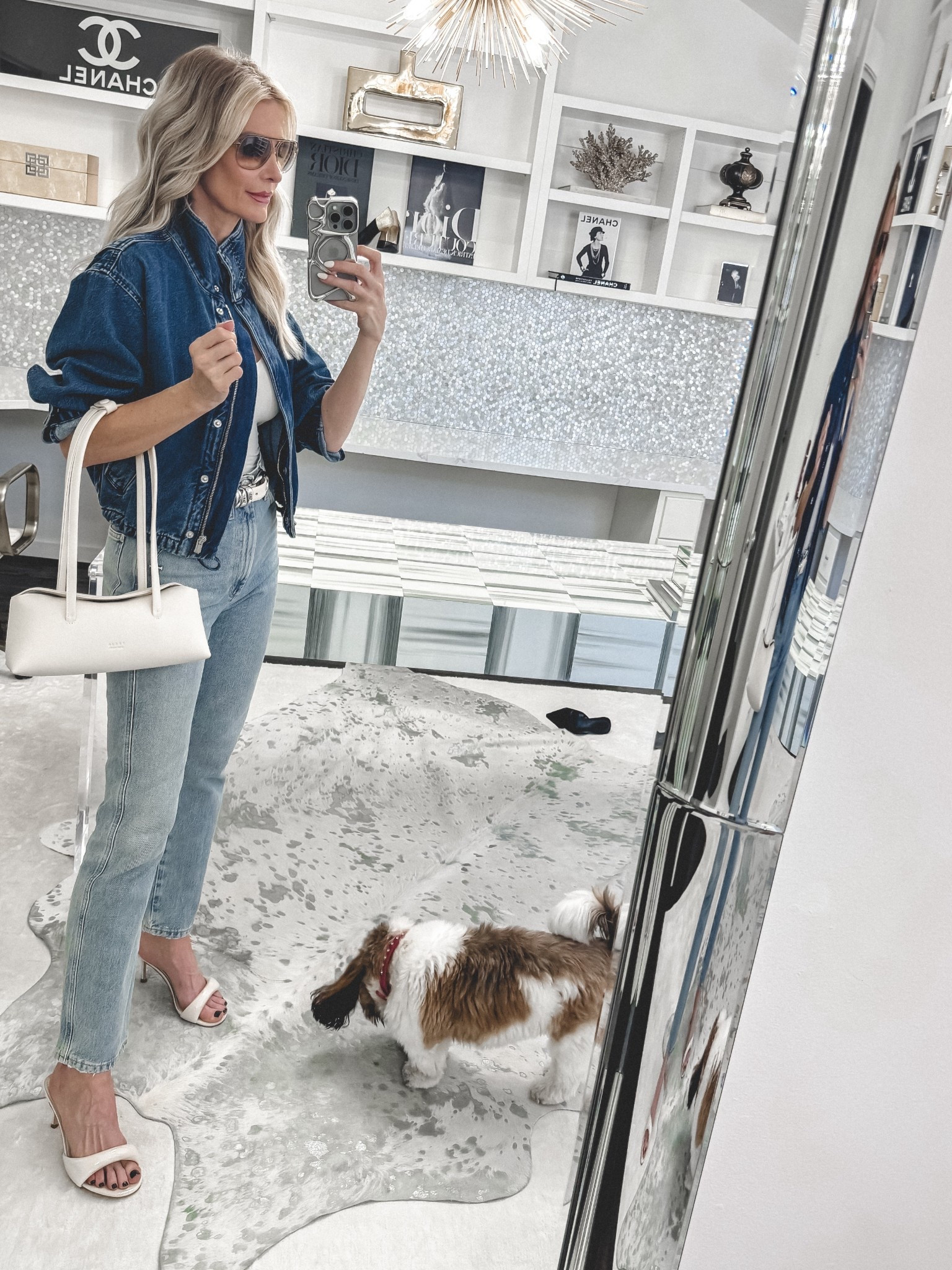 This  Madewell high-collared denim bomber jacket is the biggest jacket trend we’re seeing everywhere for 2026 and I totally get the hype. It’s structured, flattering, and instantly makes any outfit look more elevated. 

Here’s how I took it from wearing to styling:

✔️ Popped the collar + buttoned it at the top
✔️ Pushed up the sleeves (instant cool-girl vibe)
✔️ Tucked in my top + added a belt to define the waist
✔️ Swapped my black heels for ivory heels to create a more cohesive look + make my legs look longer
✔️ Added sunnies 
✔️ Grabbed a high-quality handbag for that polished finish

These little styling tweaks are honestly guaranteed to elevate any outfit.

And if you only add ONE jacket to your closet this season…let it be a high-collared bomber denim jacket. This one is SO good.

Sizing: wearing an XS in the jacket + 24 in the jeans.

#LTKdayinmylife #LTKgrwm #LTKootd