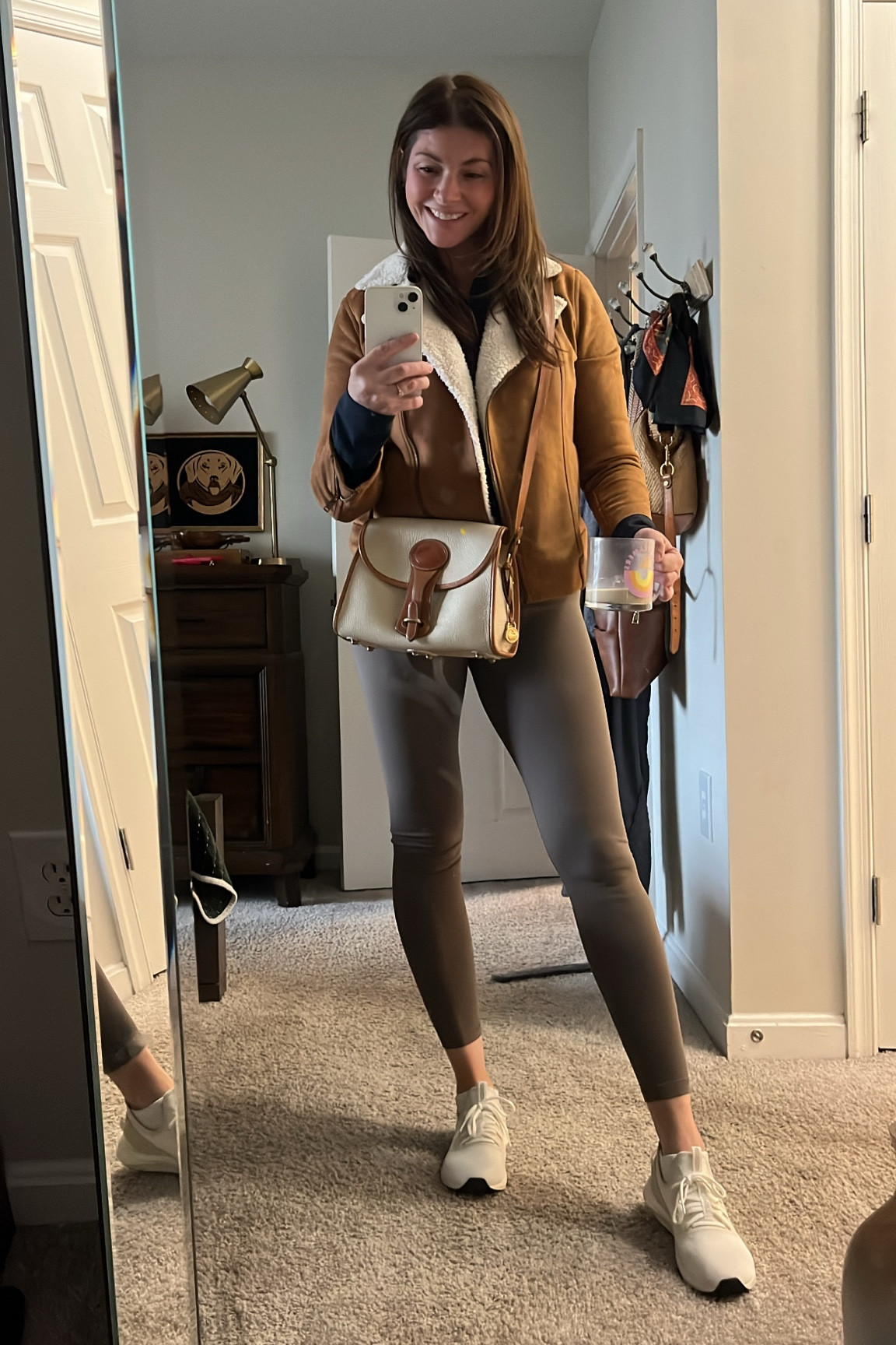 Affordable casual outfit idea for moms. Faux suede and shearling jacket. Winter outfit, leggings outfit, white sneakers, new balance, weekend outfit. 

#LTKOver40 #LTKActive #LTKMidsize