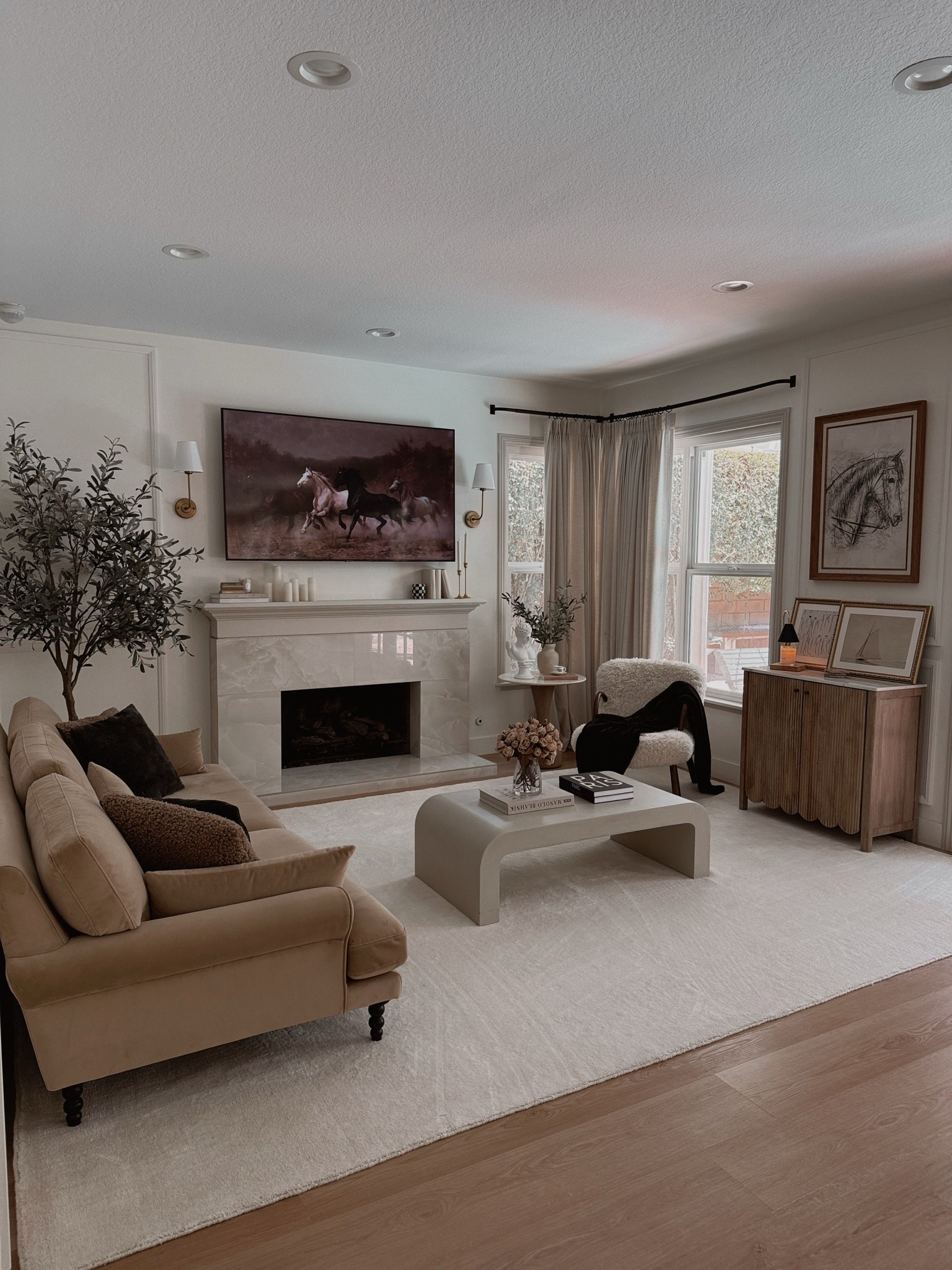 Living room • home decor • moody living room • sofa inspo
My favorite area rug: @Rugs USA 
Faux Olive tree: @Crate & Barrel

#LTKHome