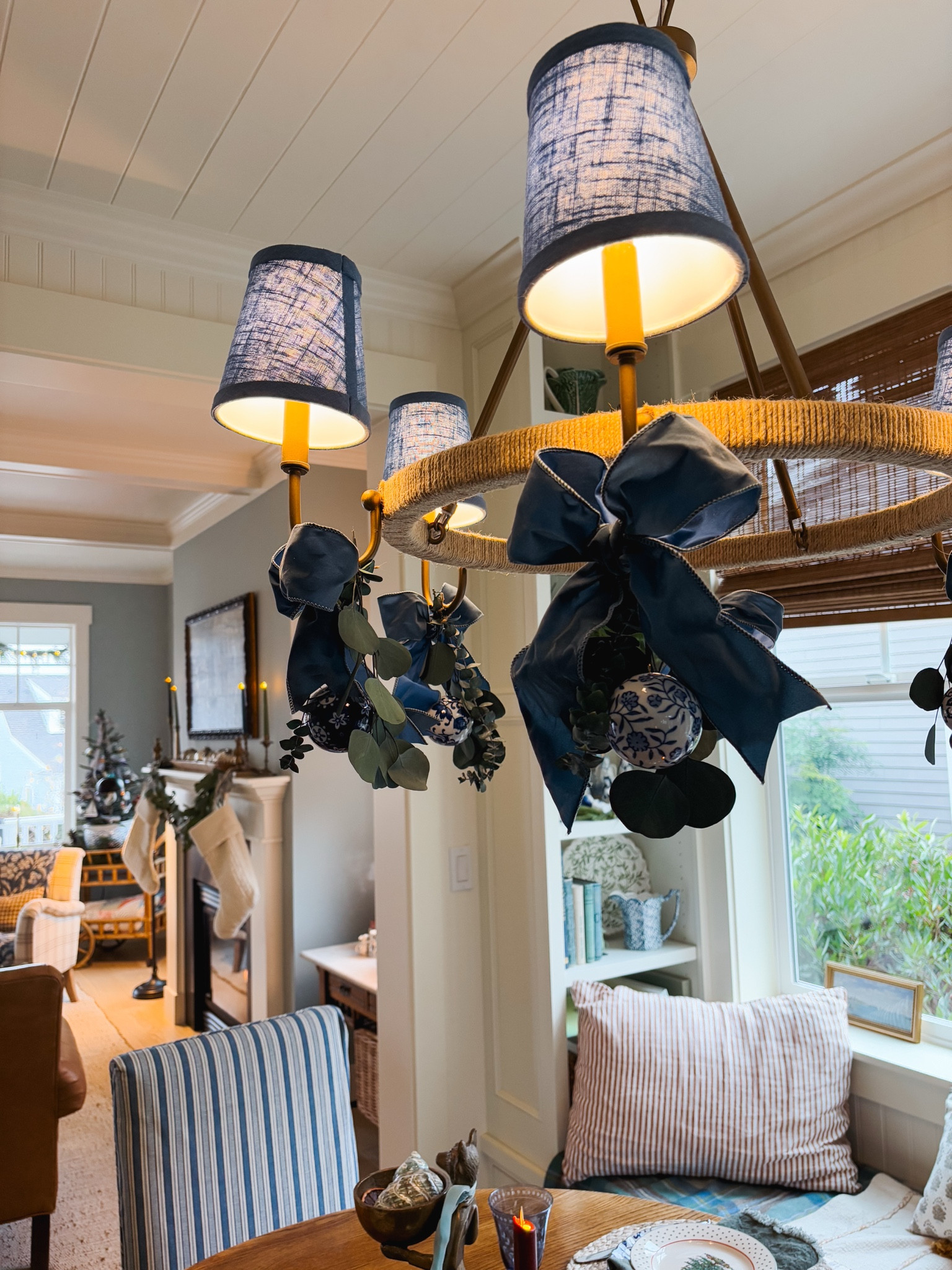 Chandelier with chinoiserie blue and white ornaments and blue suede velvet ribbon - dining room Christmas decor 

#LTKHoliday 

#LTKSeasonal #LTKHome
