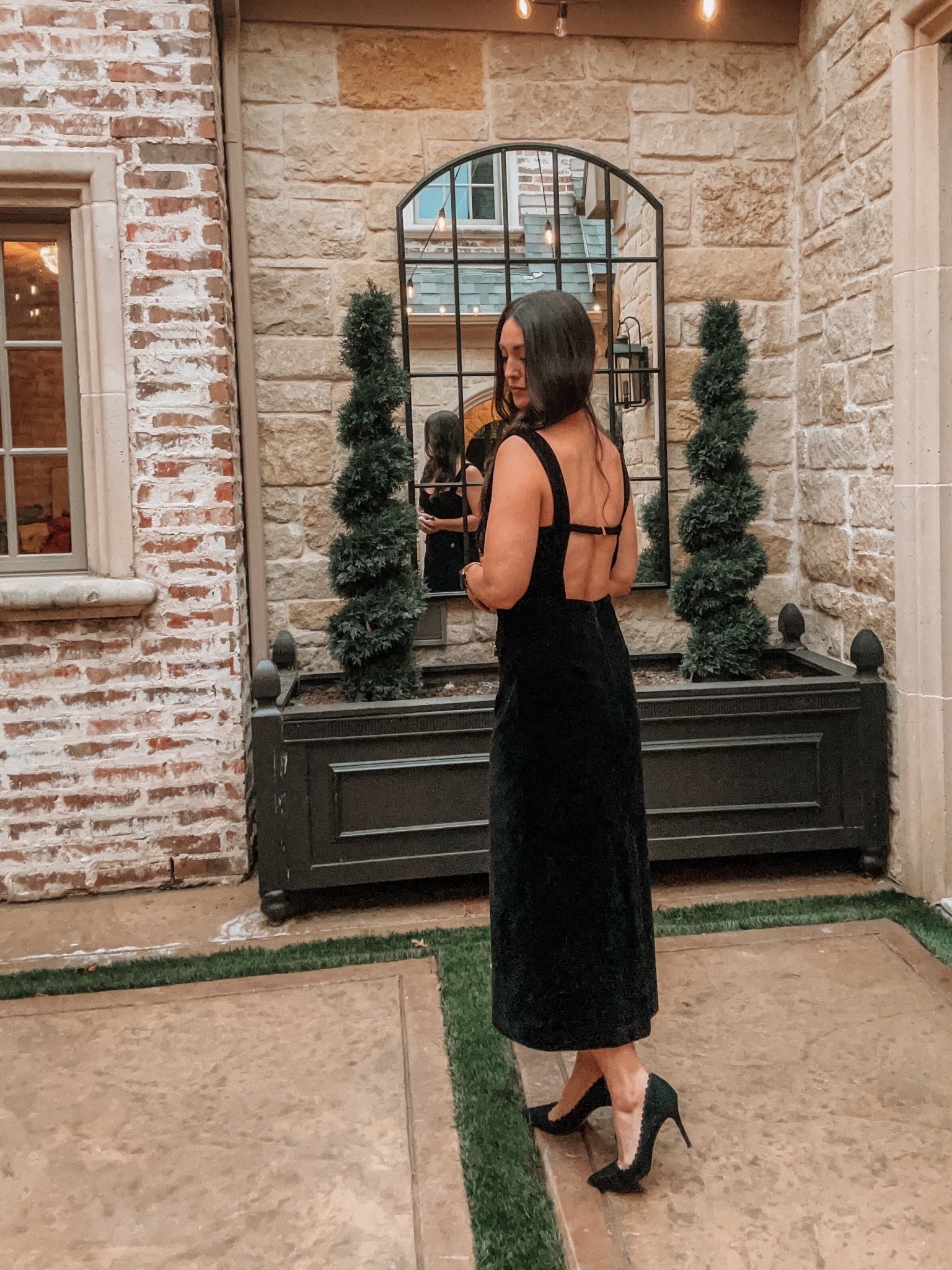 Backless black velvet holiday dress! Love the midi length and sleek silhouette. 

#LTKSeasonal #LTKHoliday #LTKootd