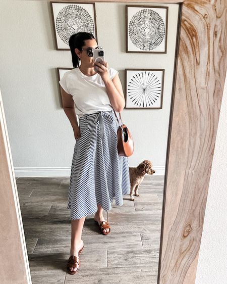 I’ve linked a similar tee!

My skirt is on sale ! I’m in the 10 of the skirt. Fit is TTS.

I’ll link similar sandals. These are Zara. 