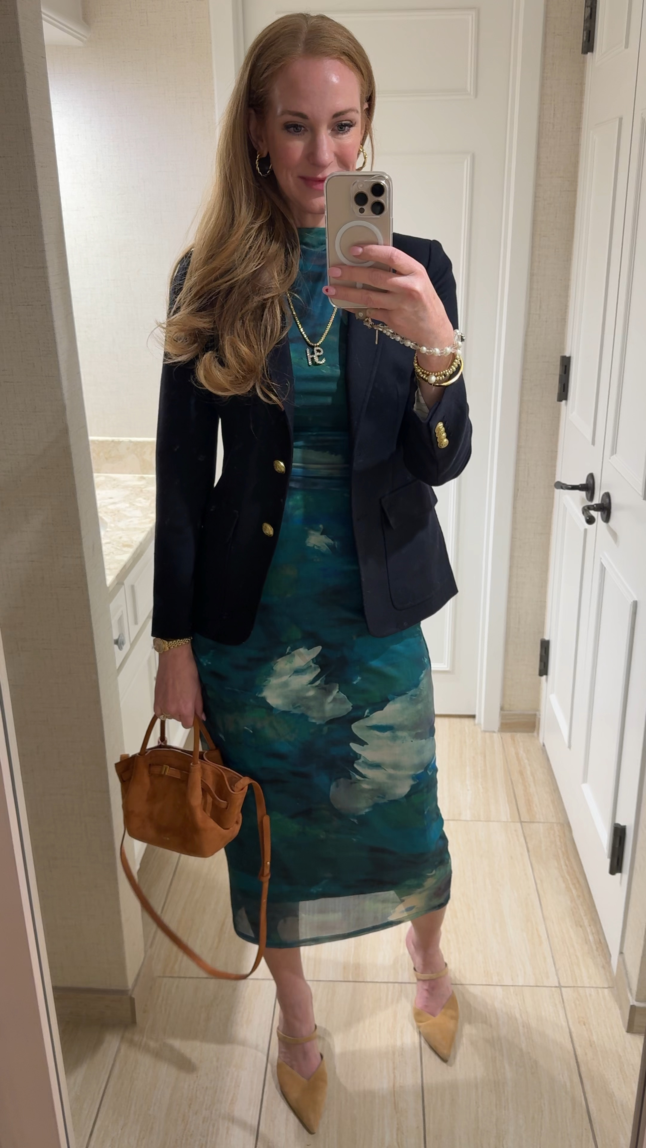 This dress from Amazon is so perfect! It’s stretchy and comfortable and comes in other colors and patterns. I paired it with a blazer for a work look, but would be so cute without for a dinner or wedding or any type of event!

#LTKWatchNow #LTKStyleTip #LTKFindsUnder50