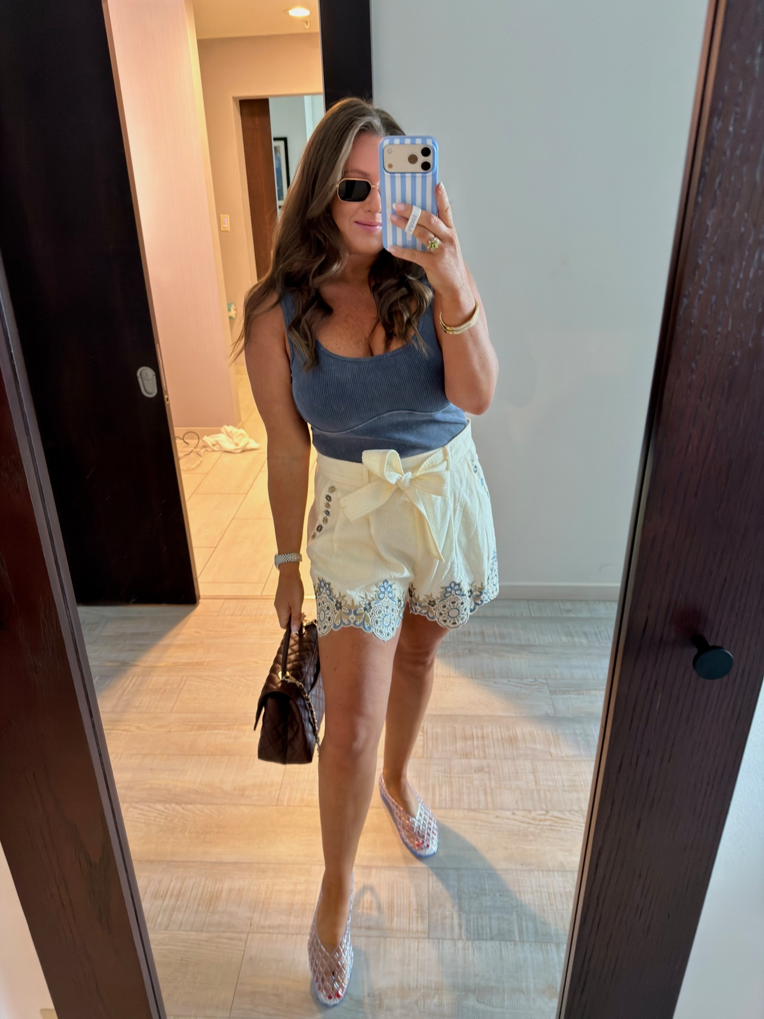 Dolce vita jelly sandals 
White tie shorts Christy Lynn shorts not linkable. Size down  
Prada gold aviator sunglasses 

#LTKdayinmylife #LTKootd #LTKgrwm