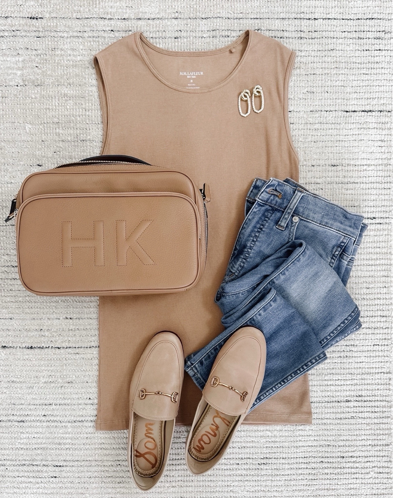 Summer outfit with tan knit tank and my favorite jeans! Recommend sizing down on the jeans because they tend to run larger. Perfect for casual work from home, lunches and more 

#LTKStyleTip #LTKSeasonal