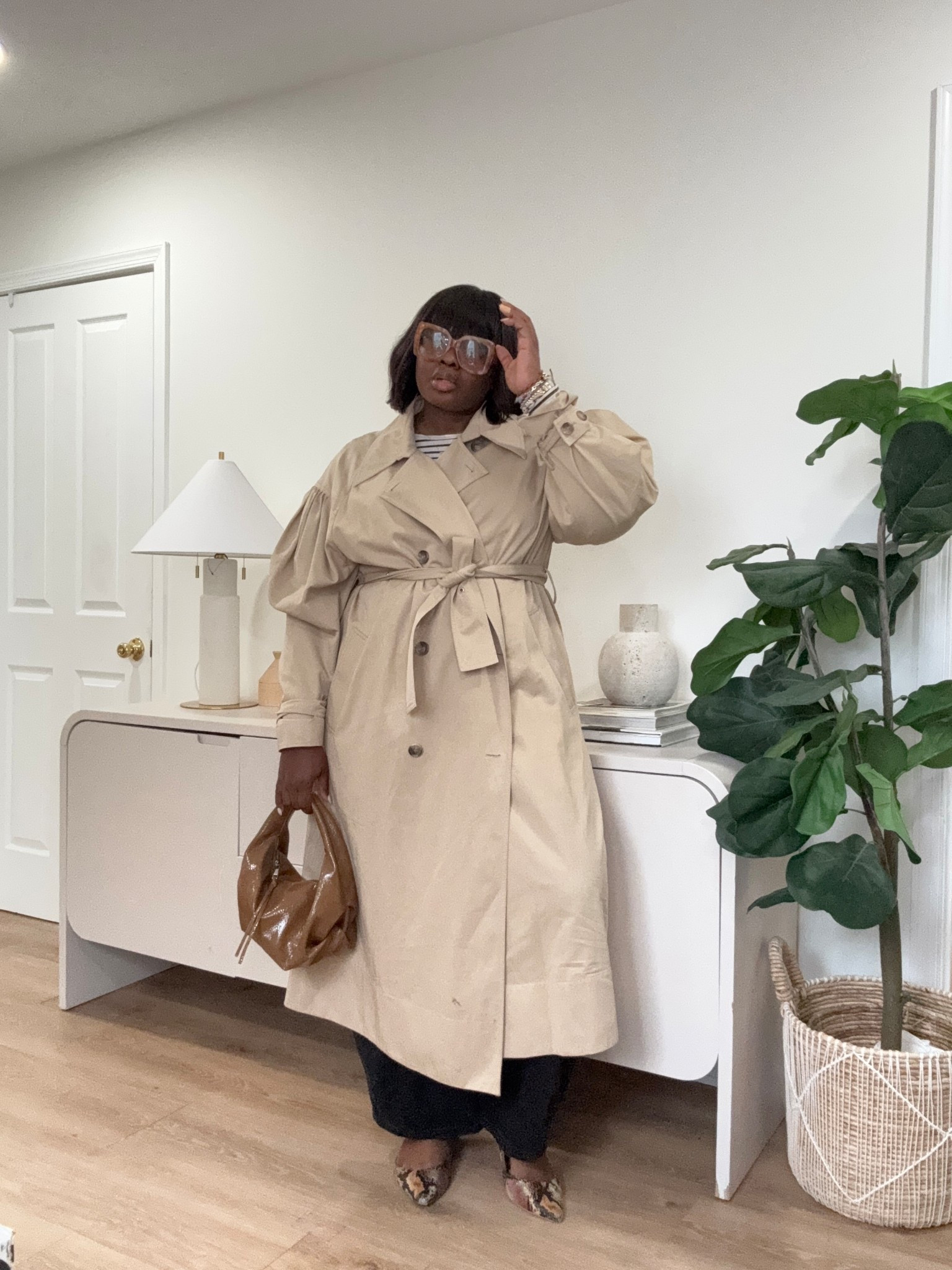 On days when I don’t feel like doing too much, I throw this on. A good trench, simple layers, and done. It always gives that effortless, styled look. Easy outfit formula that always works. #effortlessstyle #ltkfashion #neutralstyle #everydayoutfit #classiclook #styleideas #minimalchic #outfitrepeat #fashioninspo #dailywear

#LTKSeasonal #LTKootd #LTKFestival