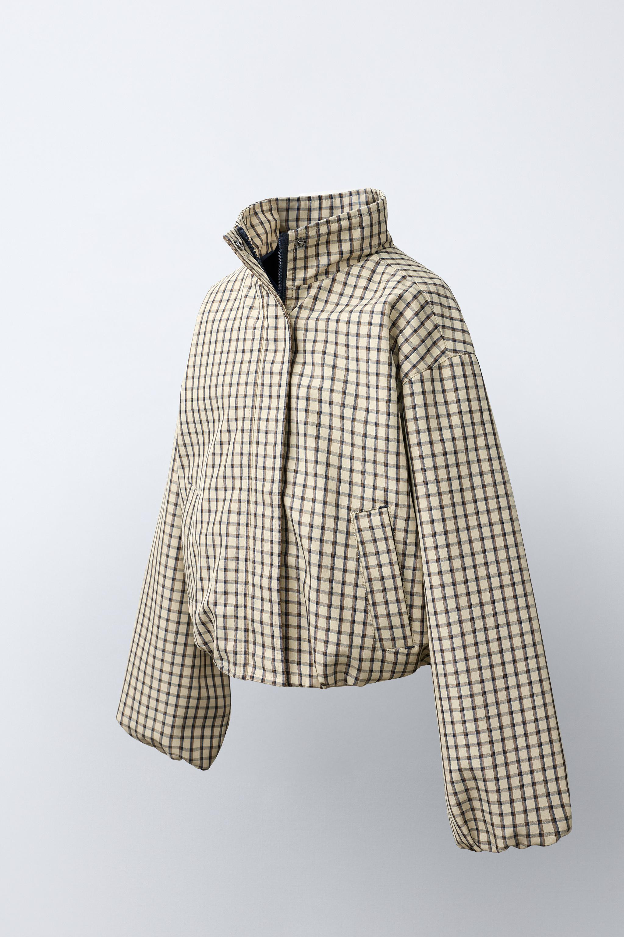 Jacket with a high collar and long balloon sleeves with elastic cuffs. Front zip closure conceale... | Zara US