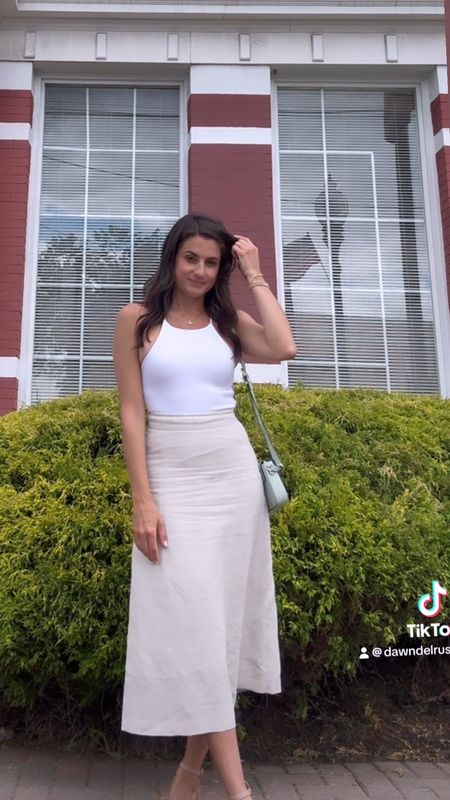 Linen skirt and white bodysuit for a graduation outfit 