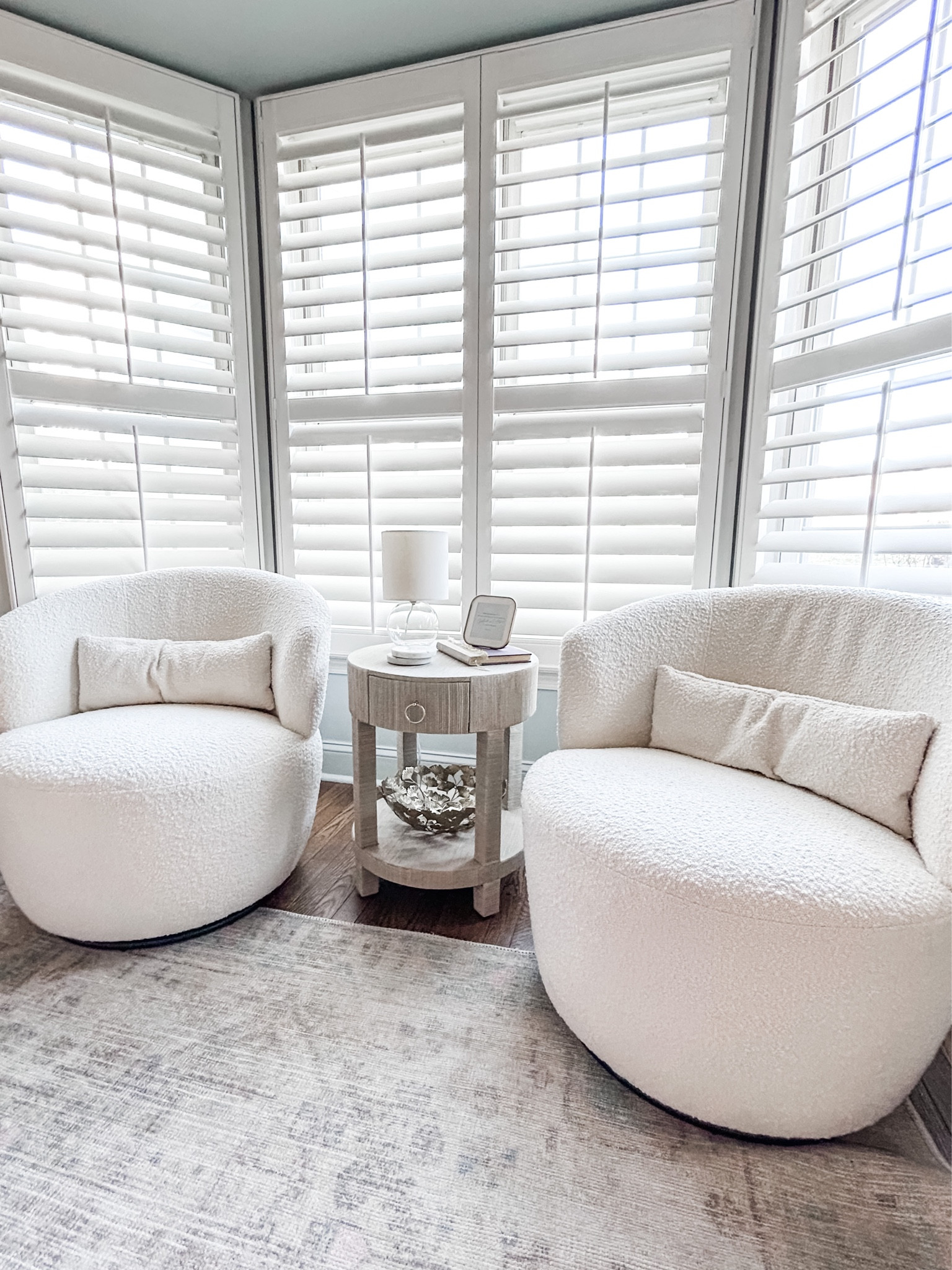 Love my new raffia side table! It’s the perfect fit between my swivel chairs in my home office!

Round side table, woven end table, raffia side table with drawer, glass sphere mini lamp, clear glass lamp, bouclé swivel chair, home office decor, marble coaster set, round end table, small gold metal frame, blush area rug, distressed area rug, flat weave tonal rug, transitional area rug. 

#LTKhome #LTKFind #LTKstyletip