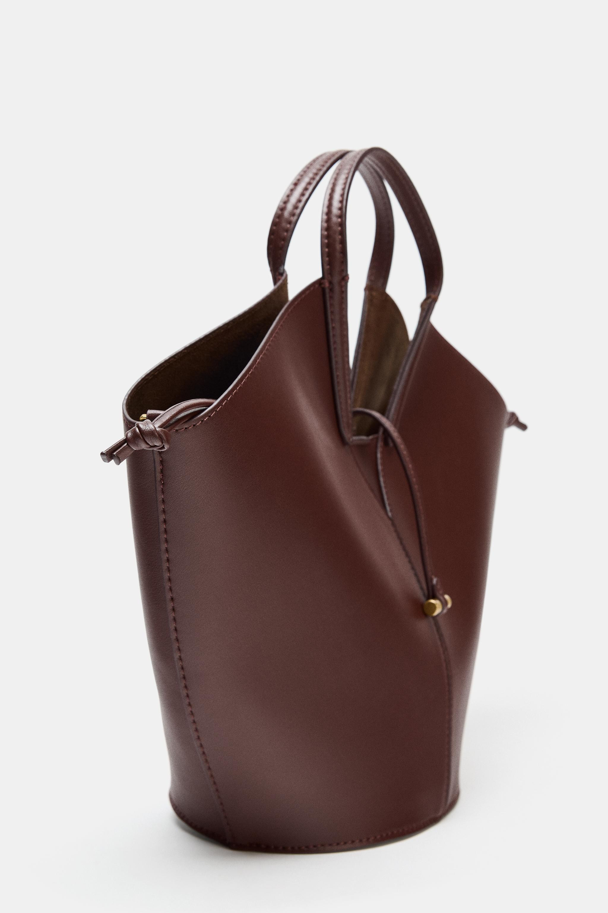 DescriptionContentsMeasurementsShopper bag. Basket style. Topstitching detail on the body. Double... | Zara US