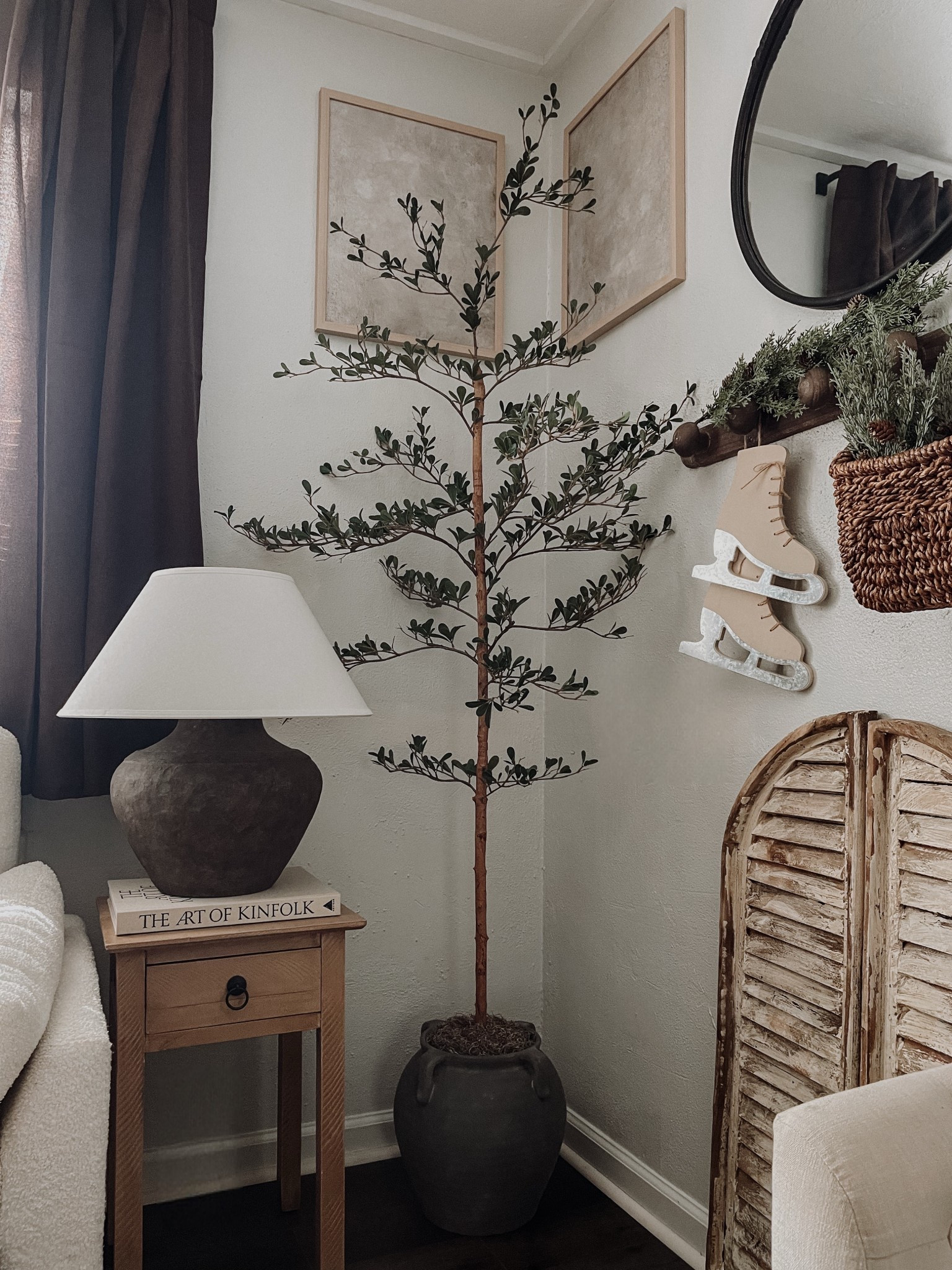 A moment for this cozy corner in my home🤎🌿 

Still can’t believe this black olive tree is under $50! I got the 6 ft one and raised it up a bit in my planter pot using a plastic dollar tree planter pot flipped upside down and stuffed with paper and cardboard, then used Spanish moss to cover it for a earthy organic look. 

#LTKHome