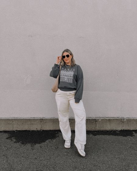 Casual midsize spring outfit - oversized sweatshirt (linked similar), linen cargo pants on sale (size L), woven leather tote, neutral sneakers 


#LTKSeasonal #LTKsalealert #LTKmidsize