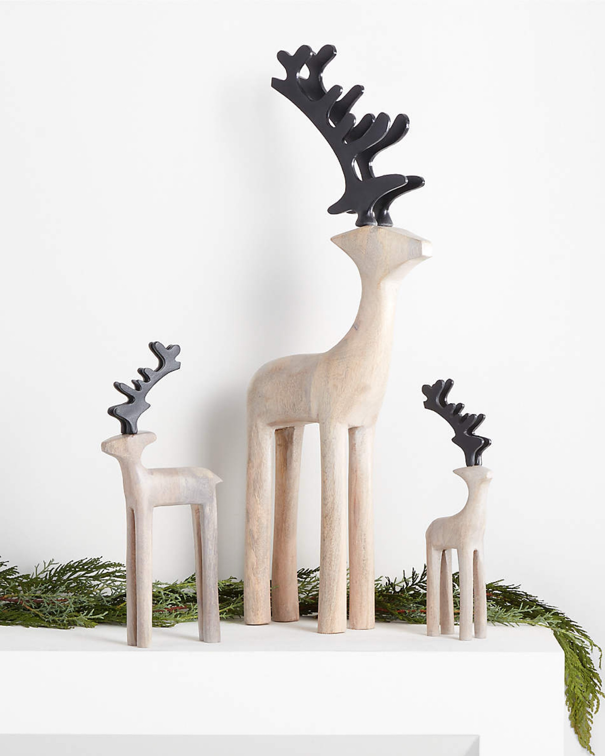 These best-selling reindeer sculptures now have a Scandinavian-inspired look, combining minimalist elegance with a touch of whimsy. Handcrafted from pale mango wood, each reindeer is thoughtfully designed with an abstracted silhouette, flowing curves, and elongated legs, creating a sense of movement as it gazes across the winter landscape. With rounded features that add a playful charm, this reindeer invites the warmth of nature into your holiday decor. Display alongside other reindeer sizes and finishes to form a miniature herd on your mantel, dining table, or buffet. 

#LTKHoliday #LTKSeasonal #LTKHome