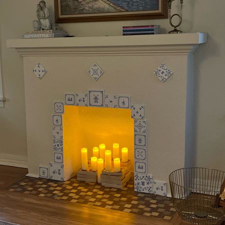 Obsessed with the way the fireplace is coming together thanks to these tile decals and flameless candles!

#LTKfindsunder50 #LTKfindsunder100 #LTKhome