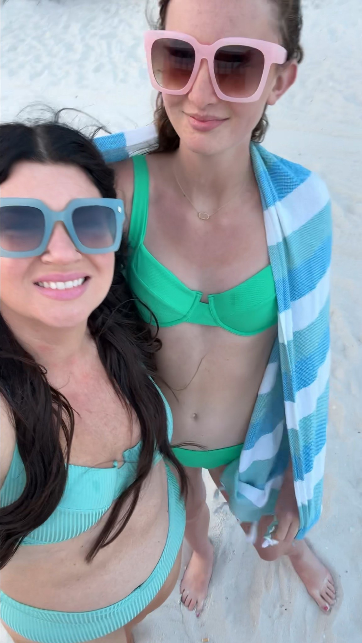 we’re wearing the same style top in different sizes and for bottoms I’m wearing the high waist and she’s wearing the regular style — vetchy 

sizing - L for me, S top M bottom for her 

#LTKSwim #LTKStyleTip #LTKTravel